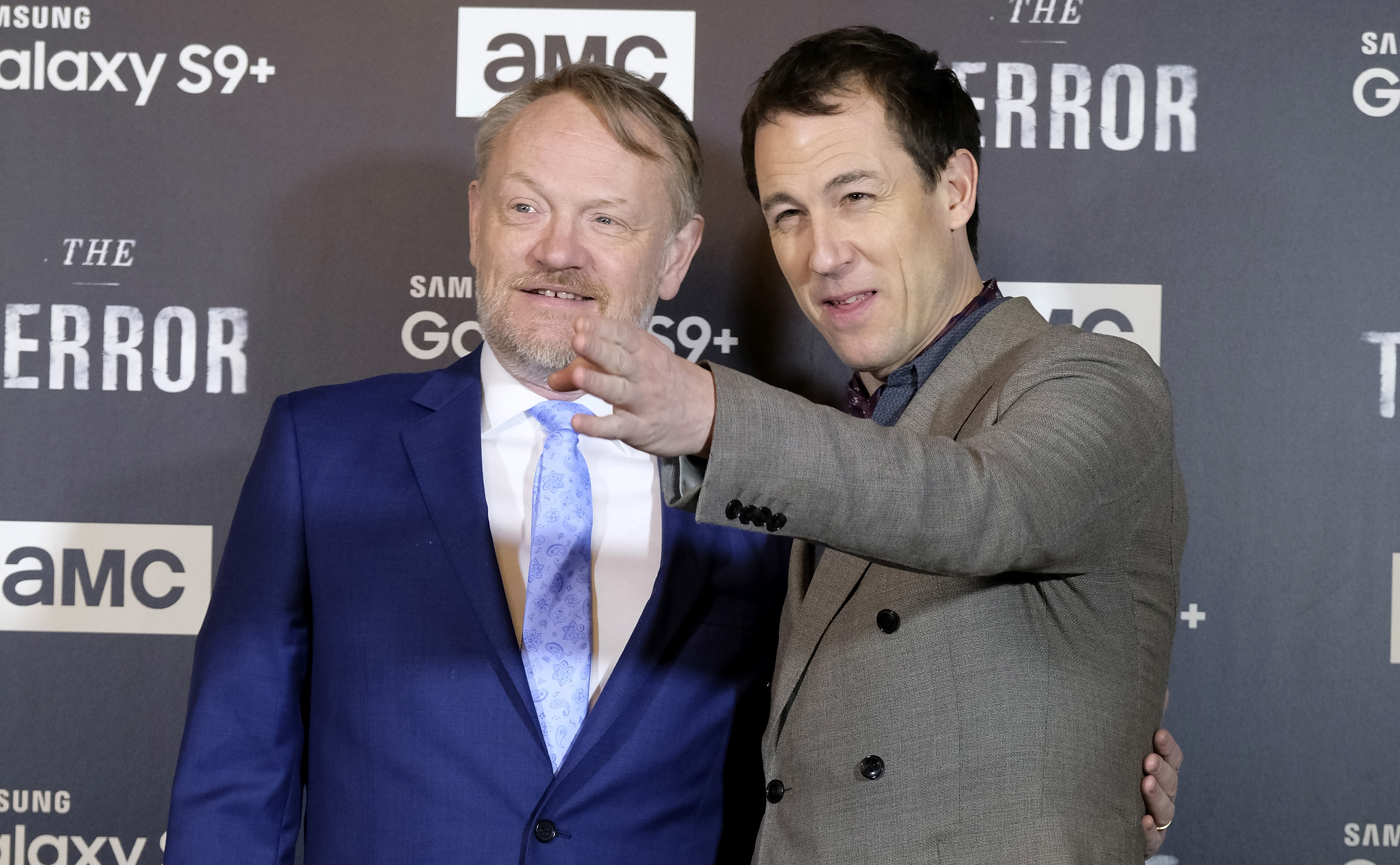 Jared Harris and co-star Tobias Menzies stand together in front of an AMC / The Terror backdrop, looking at something off screen, during The Terror’s press tour. Jared Harris and co-star Tobias Menzies stand together in front of an AMC / The Terror backdrop, looking at something off screen, during The Terror’s press tour.