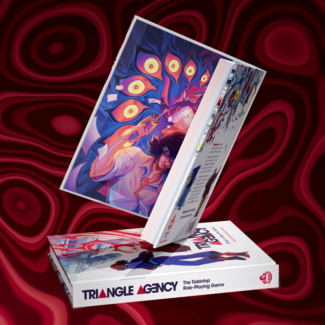 A photo shows the Triangle Agency book against a trippy red backdrop