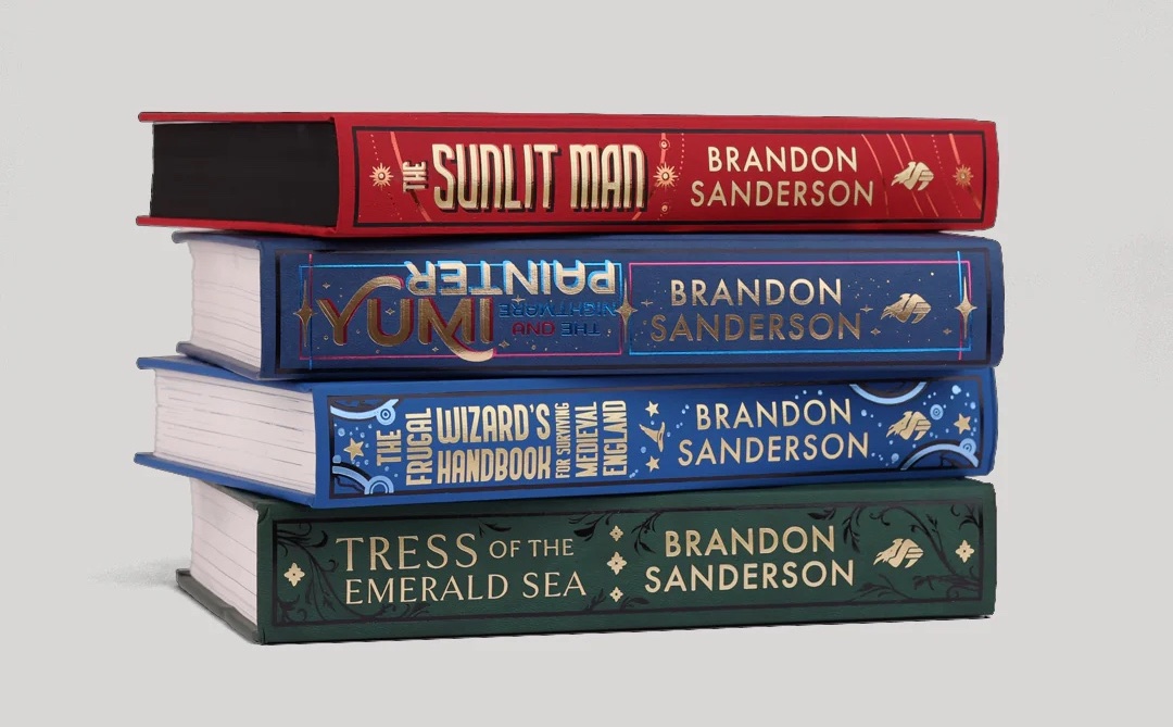 A pile of four Brandon Sanderson hardcover books: The Sunlit Man, Yumi and the Nightmare Painter, The Frugal Wizard's Handbook for Surviving Medieval England, and Tress of the Emerald Sea A pile of four Brandon Sanderson hardcover books: The Sunlit Man, Yumi and the Nightmare Painter, The Frugal Wizard's Handbook for Surviving Medieval England, and Tress of the Emerald Sea