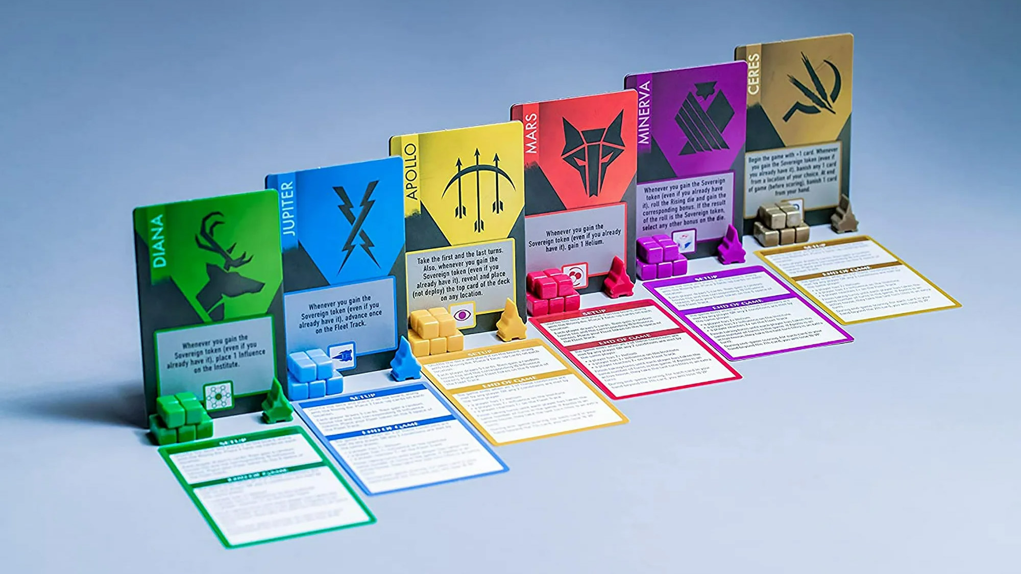 Cards for the six houses in the Red Rising board game adaptation line up on a grey-blue background. Cards for the six houses in the Red Rising board game adaptation line up on a grey-blue background.