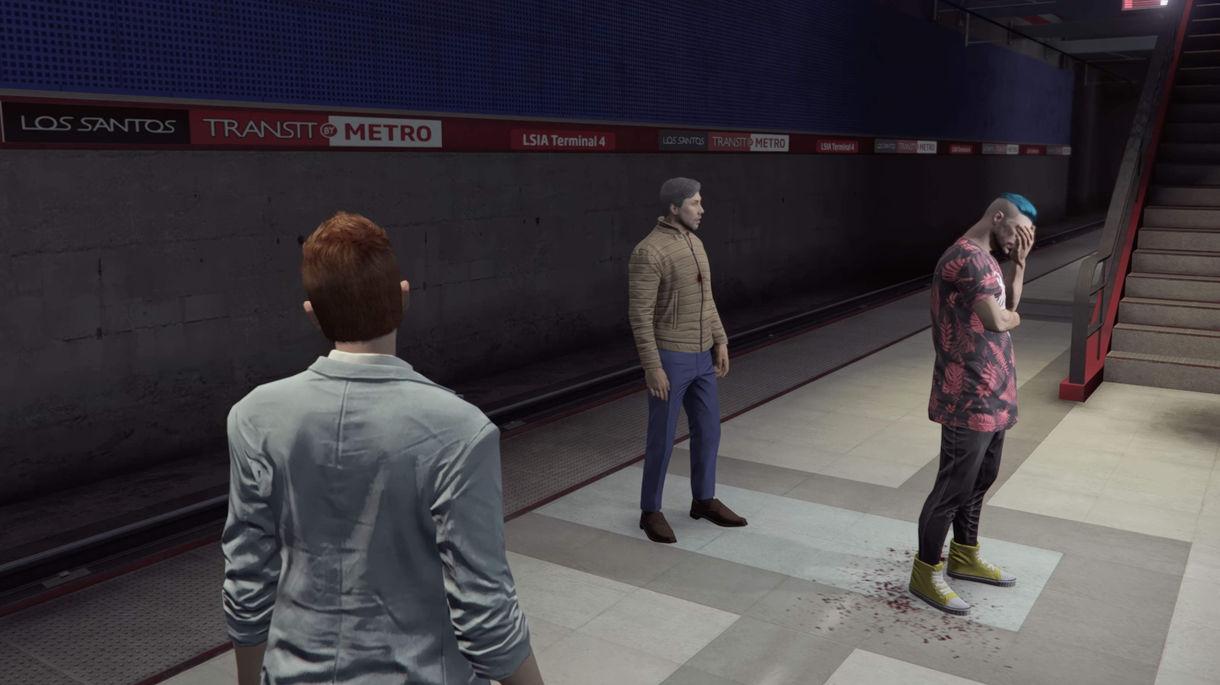 Three GTAO characters stand in a subway station in Grand Theft Hamlet. One has his head in his hands Three GTAO characters stand in a subway station in Grand Theft Hamlet. One has his head in his hands