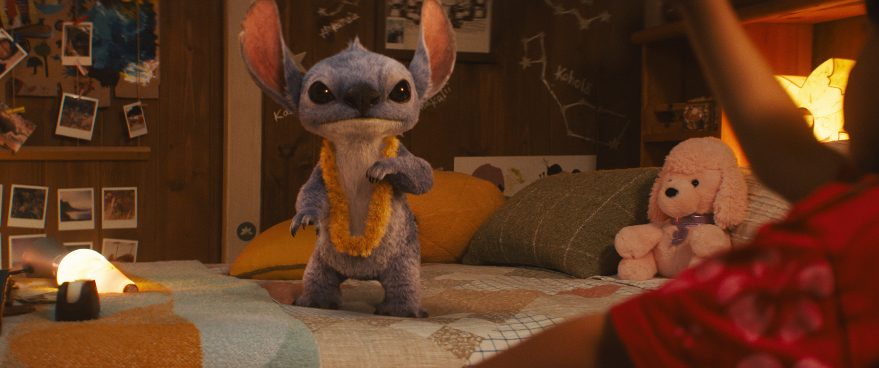 A CG image of Stitch, a long-eared blue alien, in Lilo and Stitch (2025)