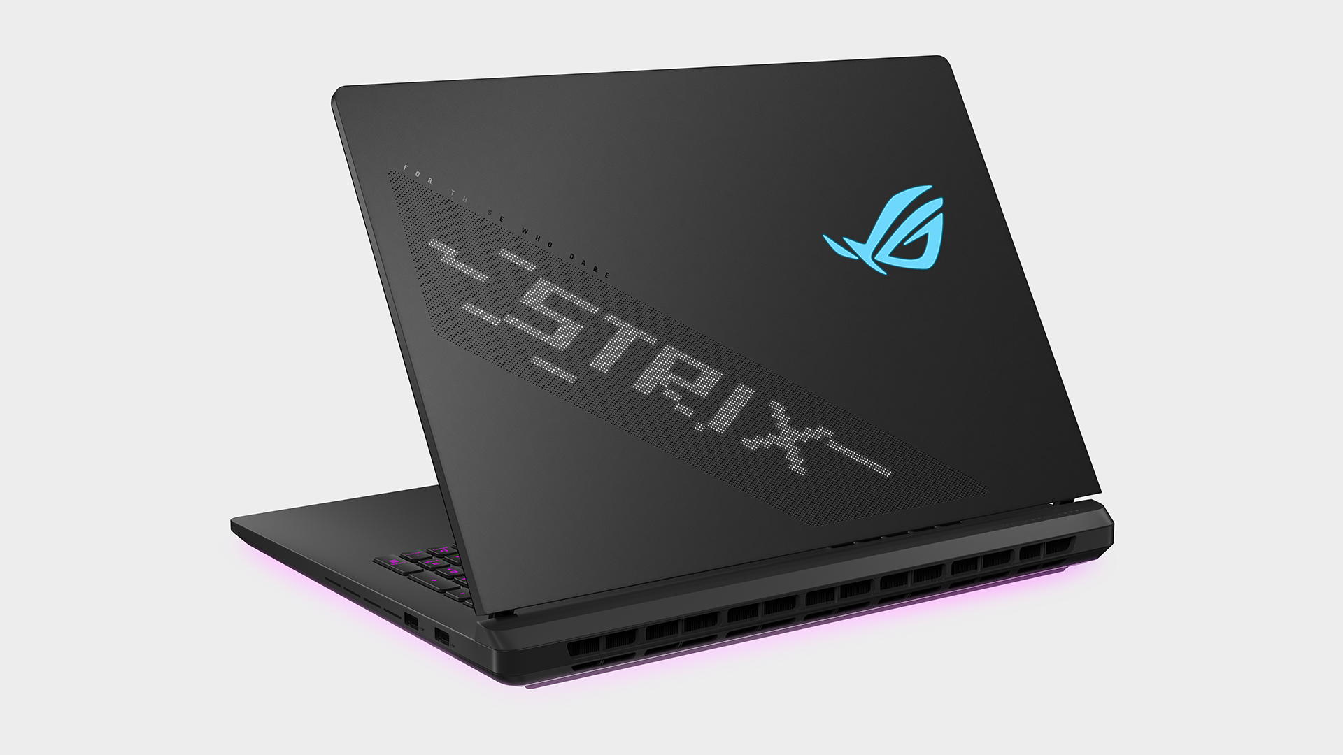 Asus ROG Strix Scar 18 laptop on a grey background.