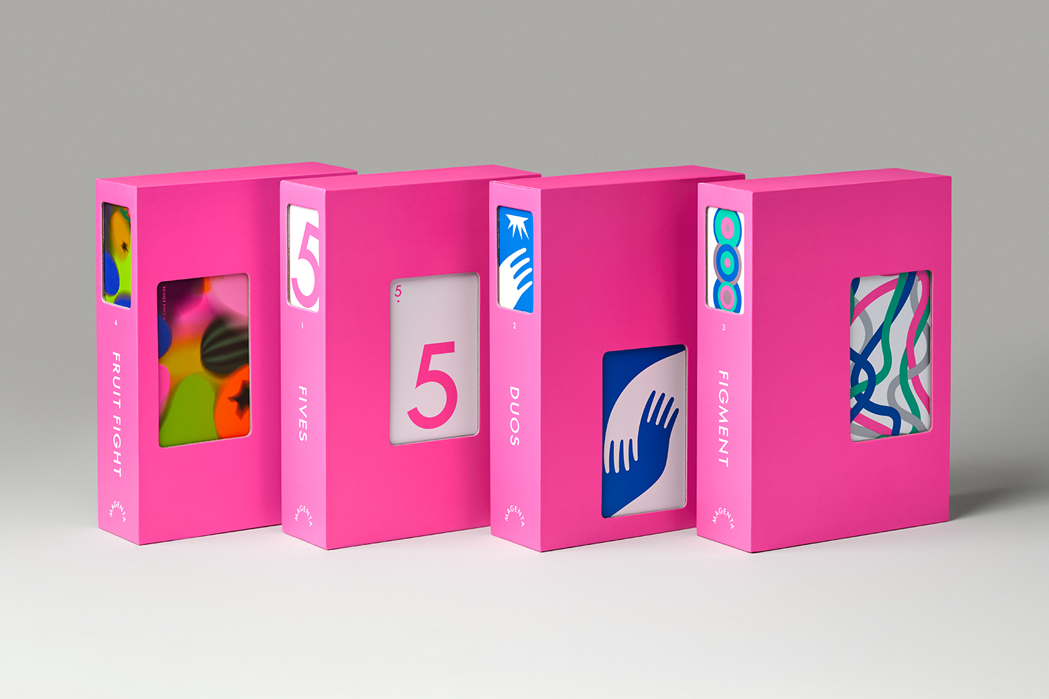 The boxes for first four games in CMYK’s Magenta series, including Figment, Fives, Duos, and Fruit Fight. The boxes for first four games in CMYK’s Magenta series, including Figment, Fives, Duos, and Fruit Fight.
