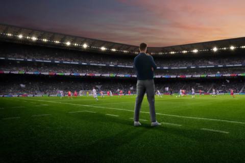 Artwork showing a team manager standing on the side of a soccer field at sunset
