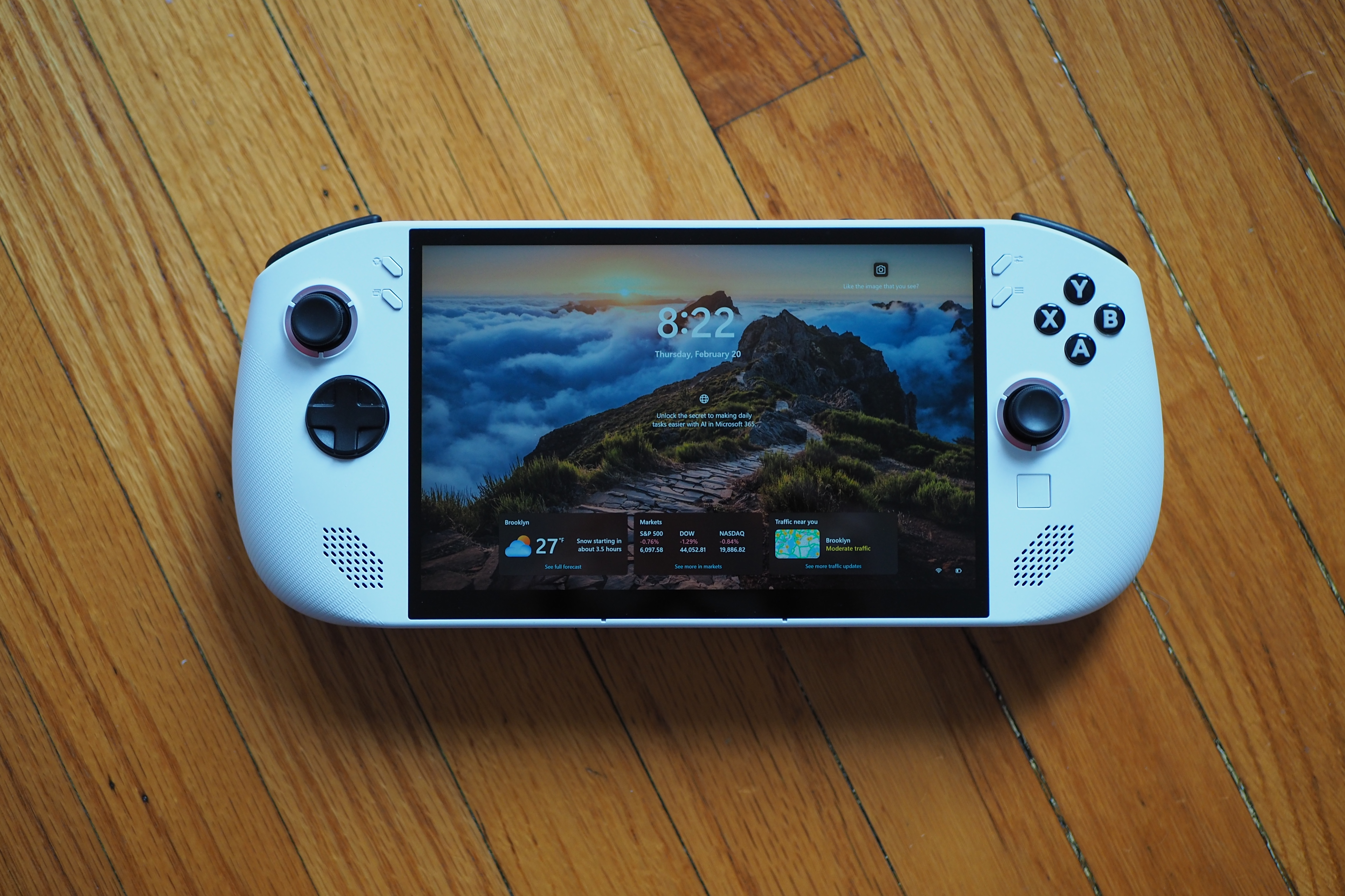 An image showing the Lenovo Legion Go S’ lock screen, which displays the time, date, temperature, stocks, and traffic in the area. An image showing the Lenovo Legion Go S’ lock screen, which displays the time, date, temperature, stocks, and traffic in the area.