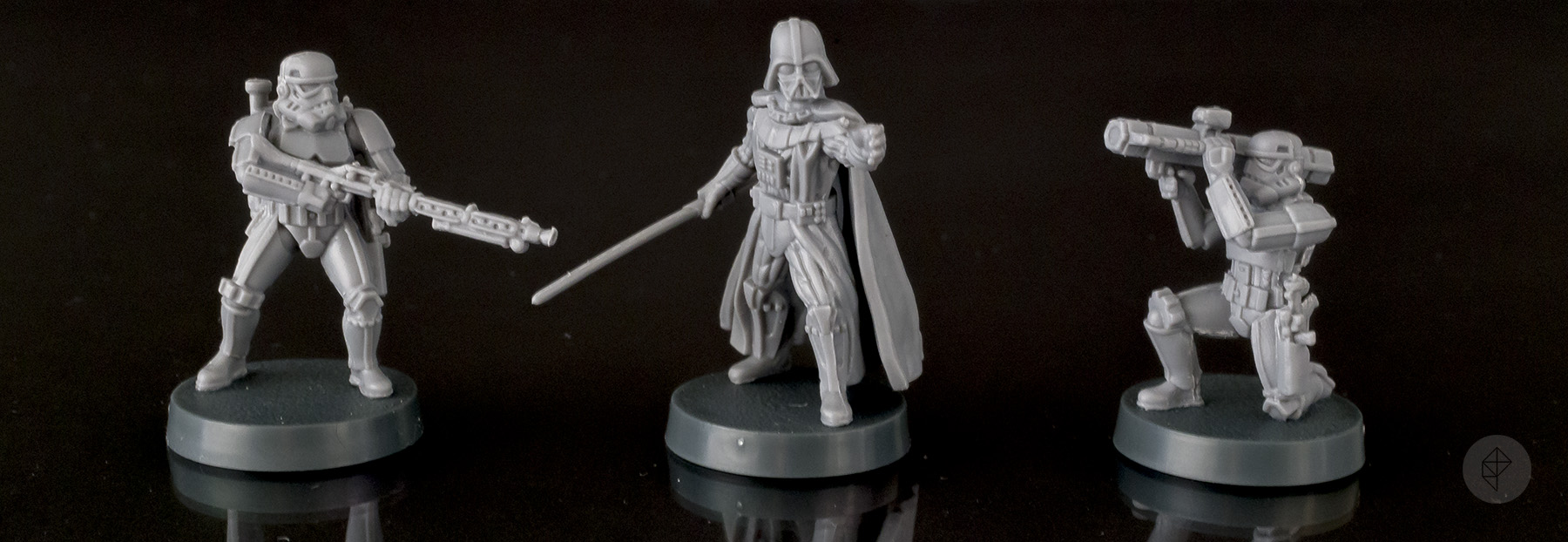 Star Wars: Legion - stormtrooper, Darth Vader, anti-vehicle trooper assembled and photographed on a mirrored table. Star Wars: Legion - stormtrooper, Darth Vader, anti-vehicle trooper assembled and photographed on a mirrored table.