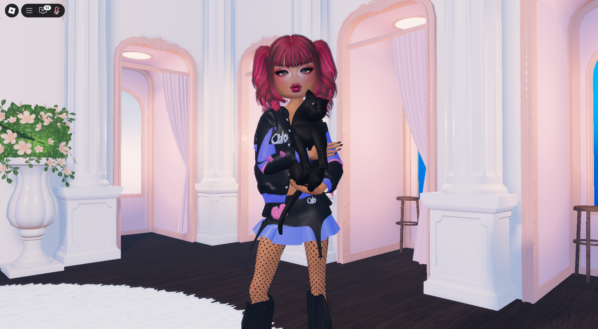 An image showing a Dress to Impress character wearing a matching jacket and skirt set while holding a black cat. An image showing a Dress to Impress character wearing a matching jacket and skirt set while holding a black cat.