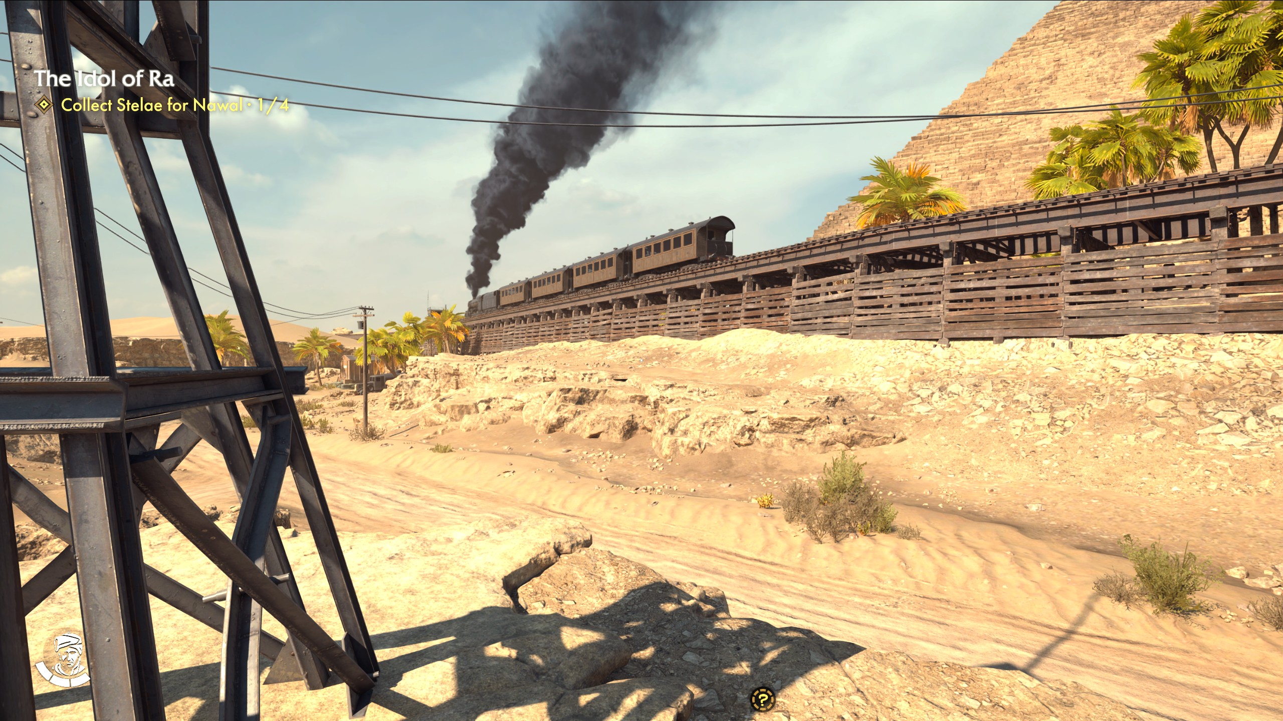 A screenshot from Indiana Jones and the Great Circle from the Egypt section of the game, depicting the shadows of some construction scaffolding in the foreground, part of a pyramid in the background, and a train on train tracks going by and emitting a large black smoke stack A screenshot from Indiana Jones and the Great Circle from the Egypt section of the game, depicting the shadows of some construction scaffolding in the foreground, part of a pyramid in the background, and a train on train tracks going by and emitting a large black smoke stack