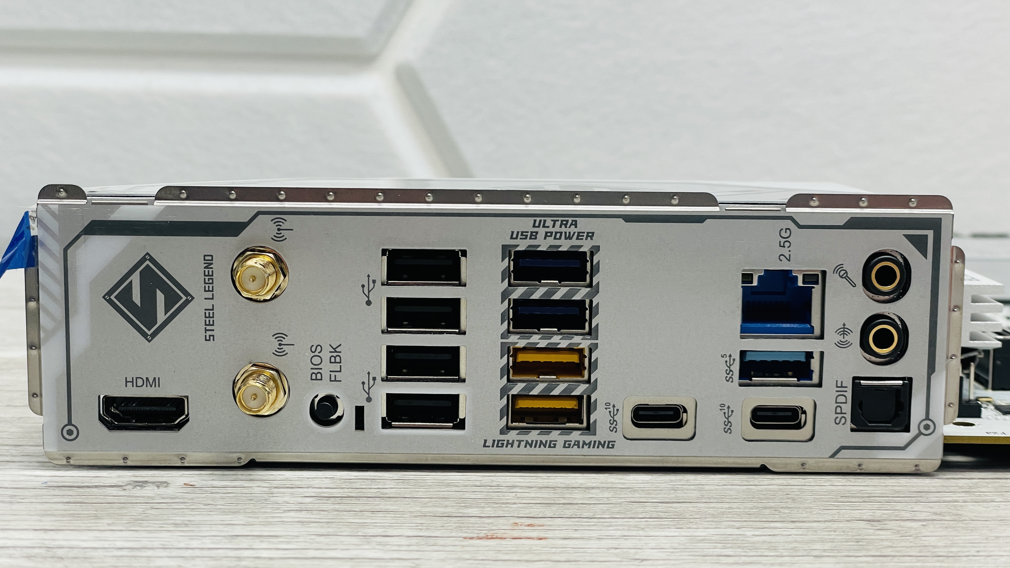 ASRock B850 Steel Legend Wi-Fi motherboard on a desk.