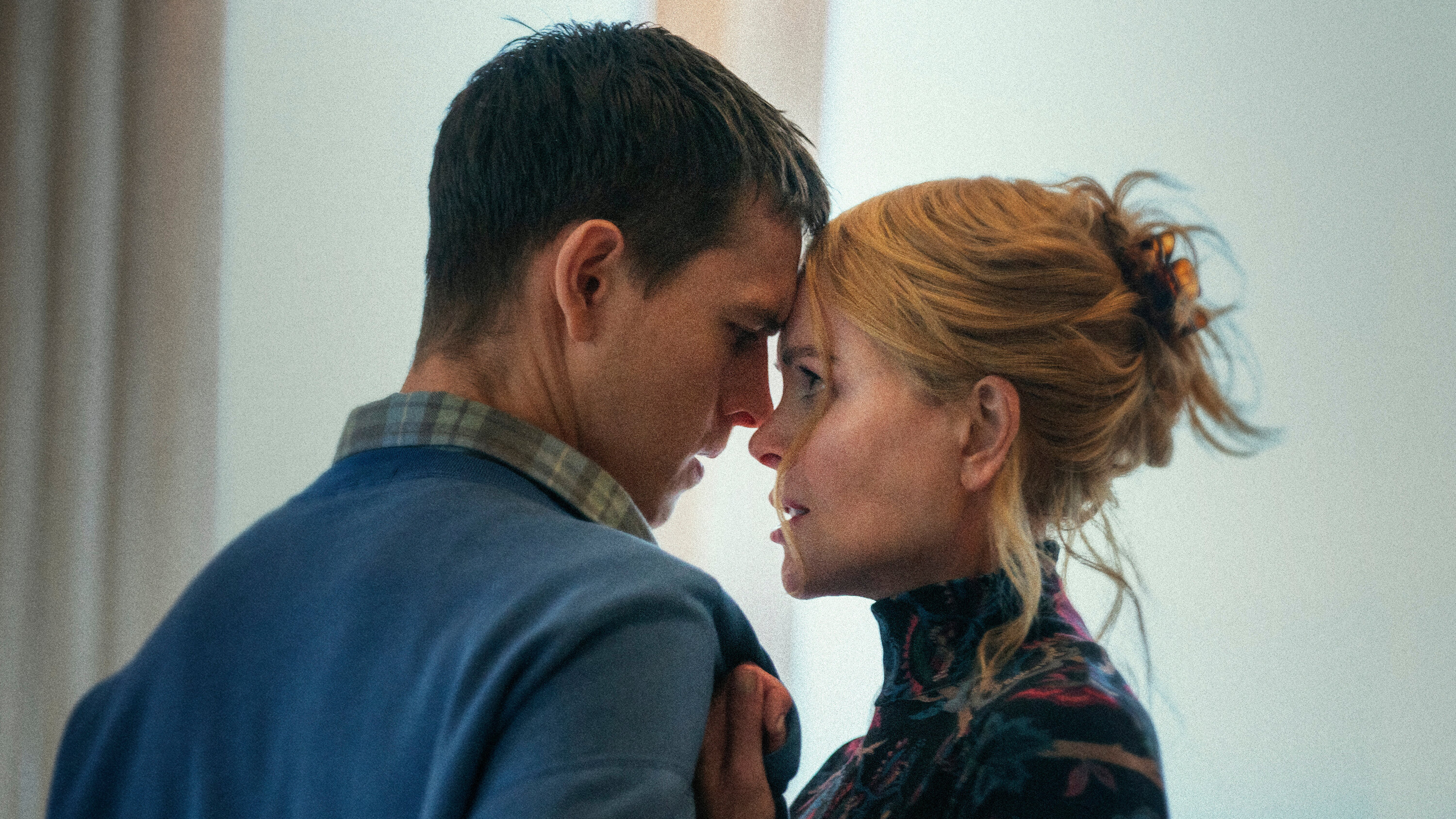 Harris Dickinson and Nicole Kidman embracing with their eyes locked in Babygirl. Harris Dickinson and Nicole Kidman embracing with their eyes locked in Babygirl.