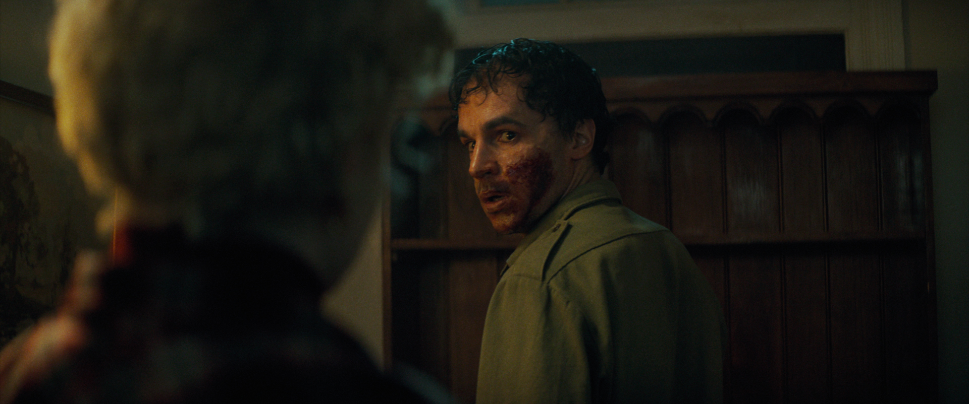 Christopher Abbott as Blake, a man with blood on his mouth, in Wolf Man. Christopher Abbott as Blake, a man with blood on his mouth, in Wolf Man.