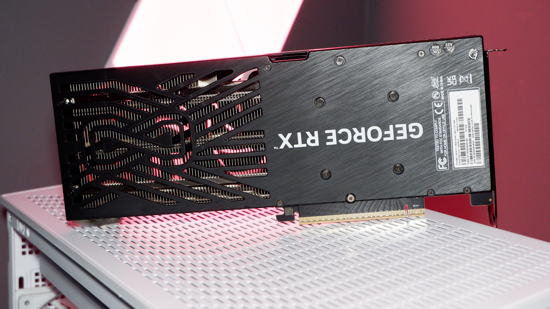 A Palit RTX 5060 Ti Infinity 3 with three fans and 16 GB of memory on a computer.