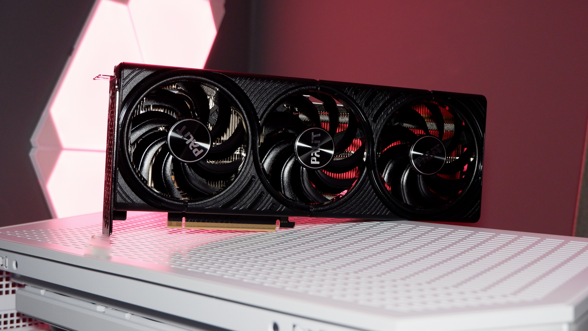 A Palit RTX 5060 Ti Infinity 3 with three fans and 16 GB of memory on a computer.