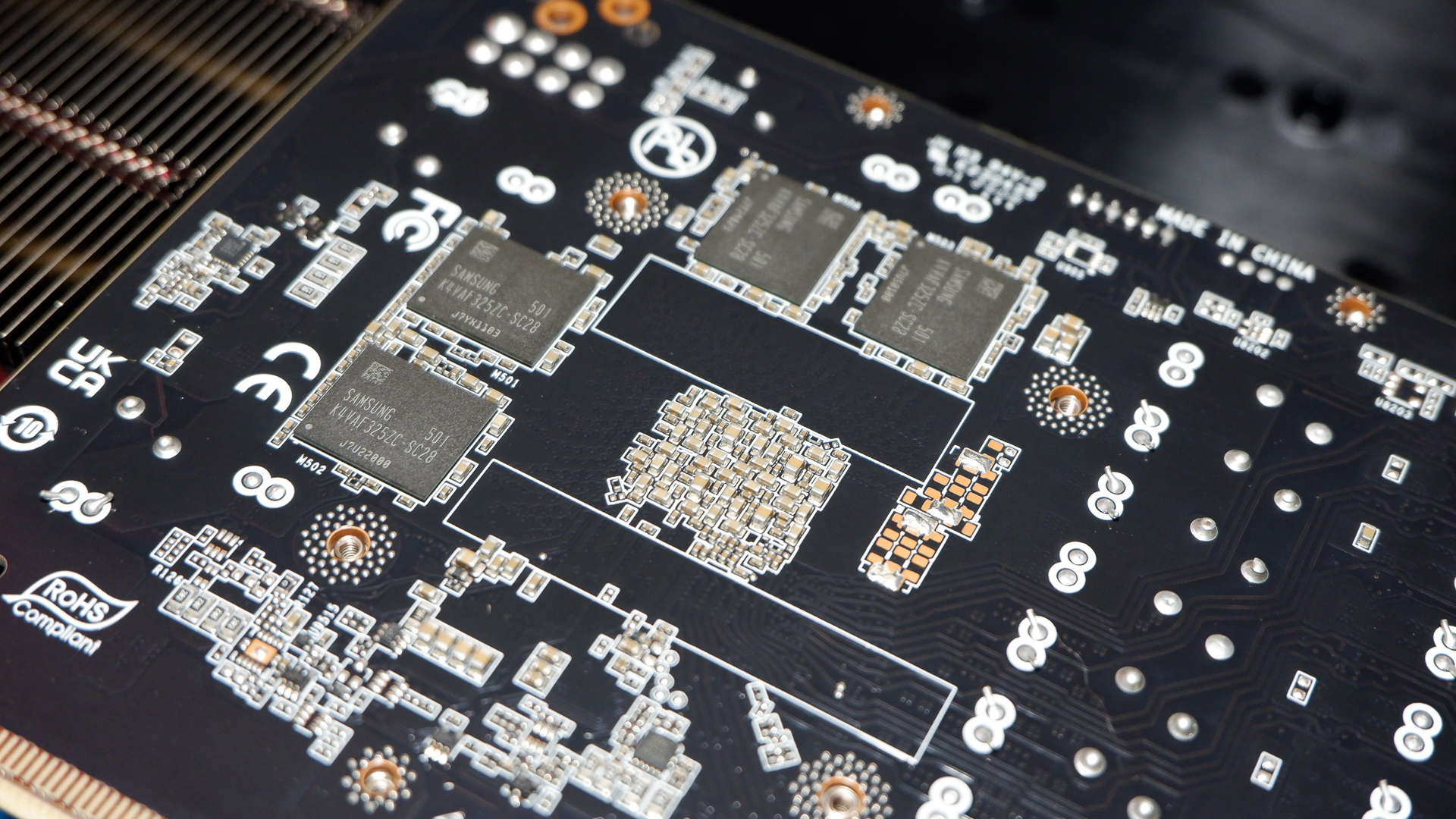 A Palit RTX 5060 Ti Infinity 3 with three fans and 16 GB of memory on a computer.