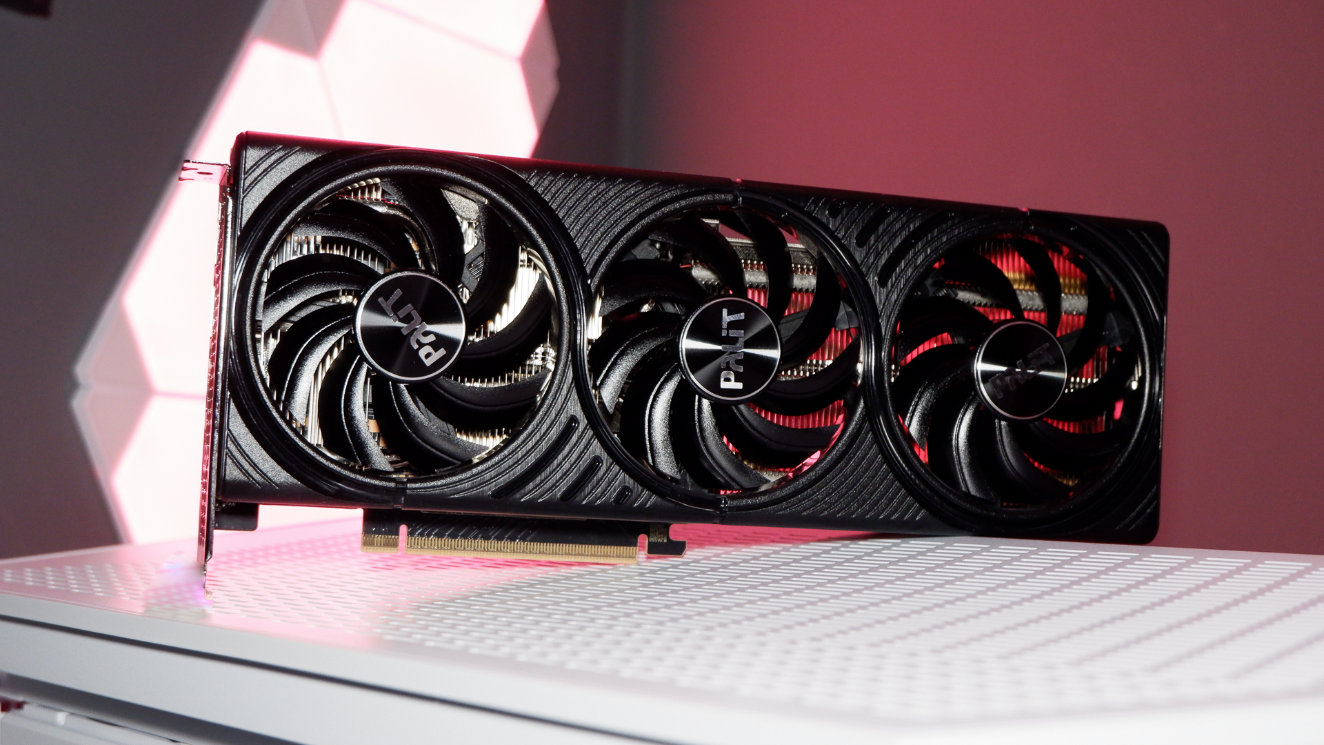 A Palit RTX 5060 Ti Infinity 3 with three fans and 16 GB of memory on a computer.