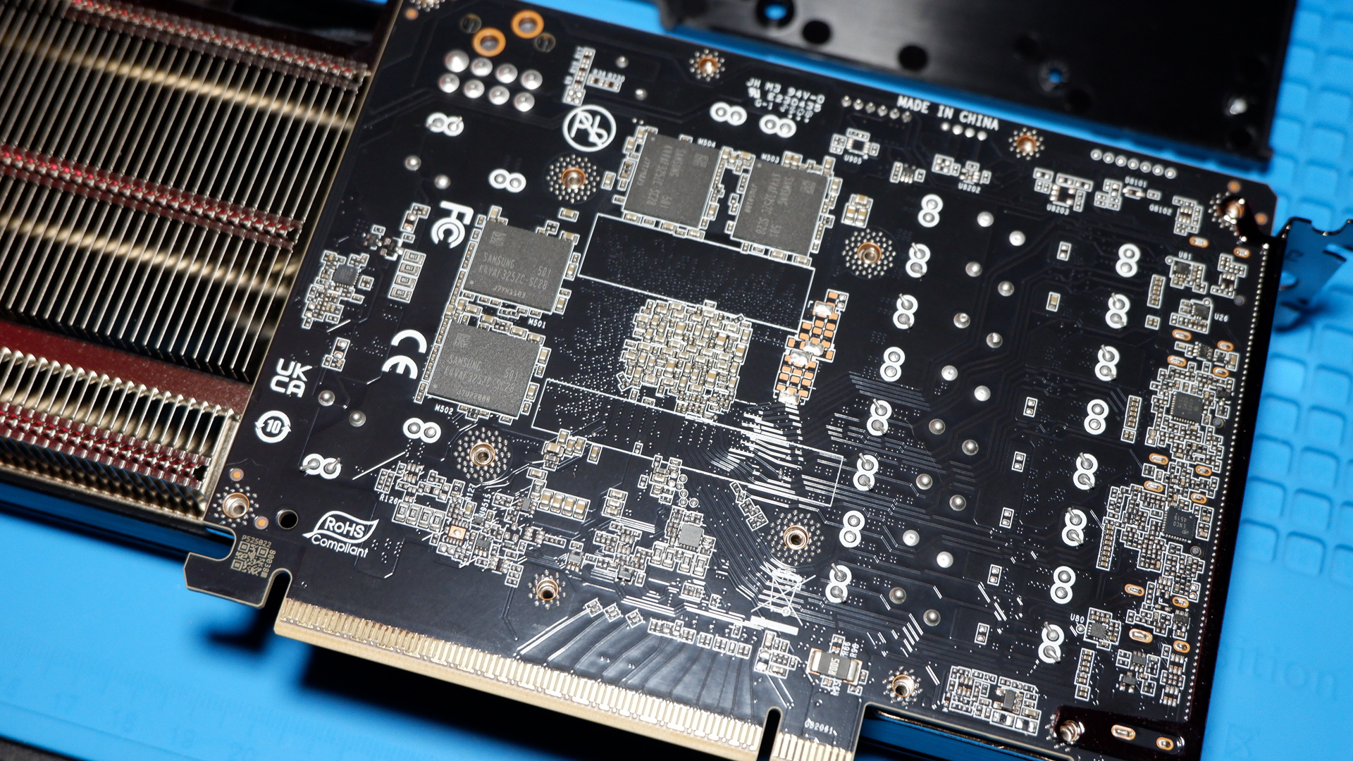 A Palit RTX 5060 Ti Infinity 3 with three fans and 16 GB of memory on a computer.