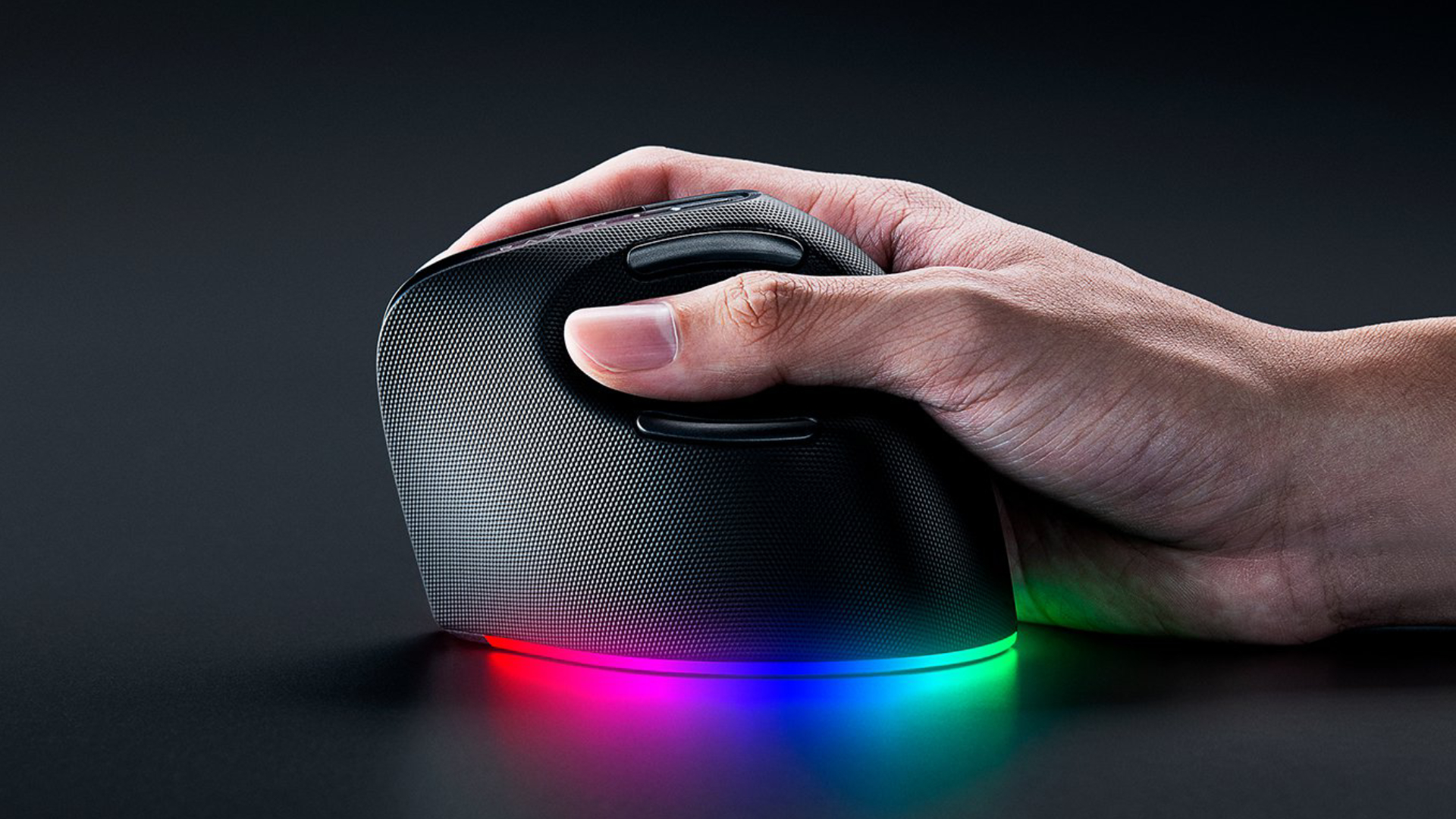 A Razer Pro Click V2 Vertical Edition mouse shot in profile, being held in the hand