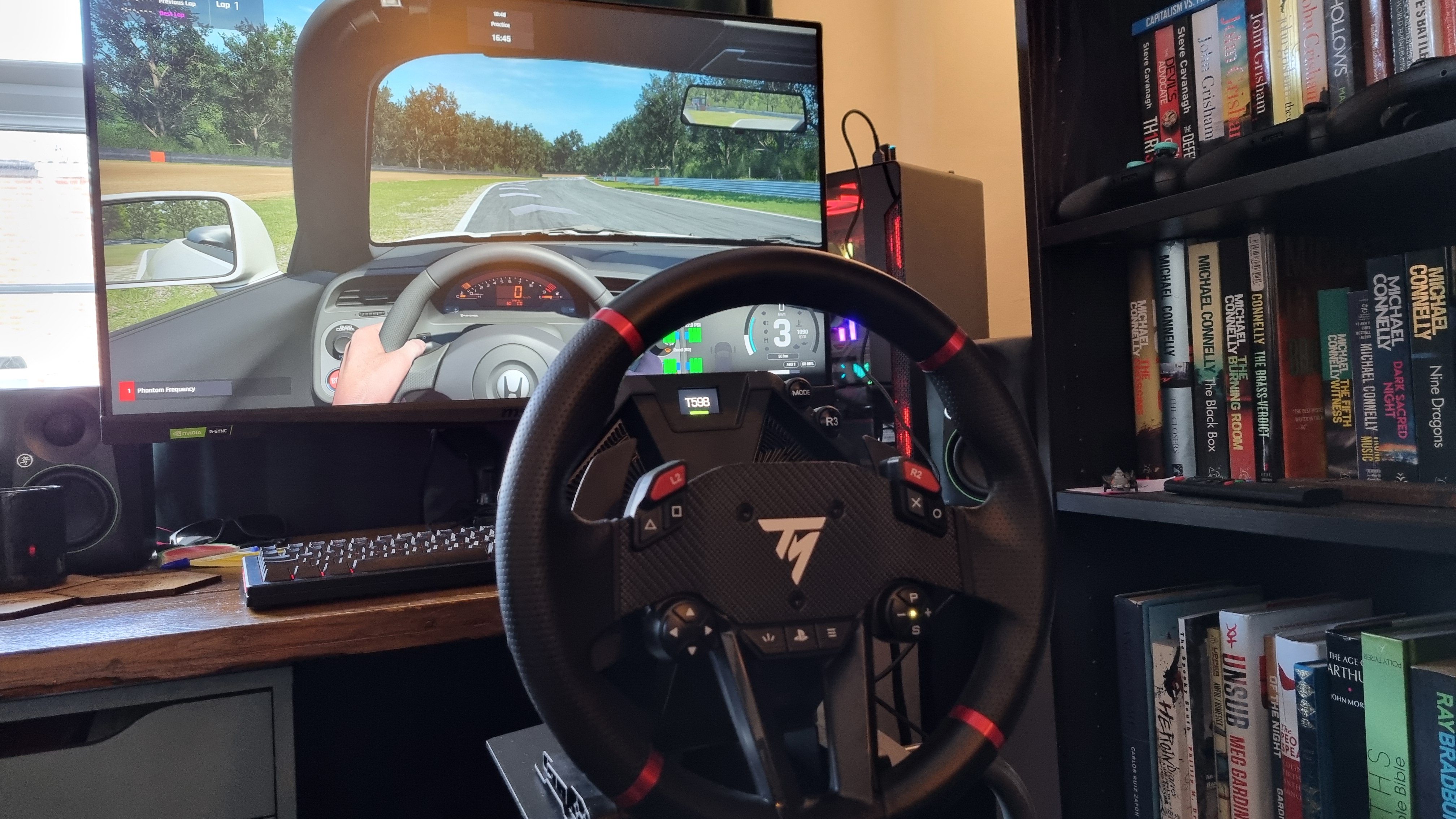 The Thrustmaster T598 racing wheel being used for sim racing