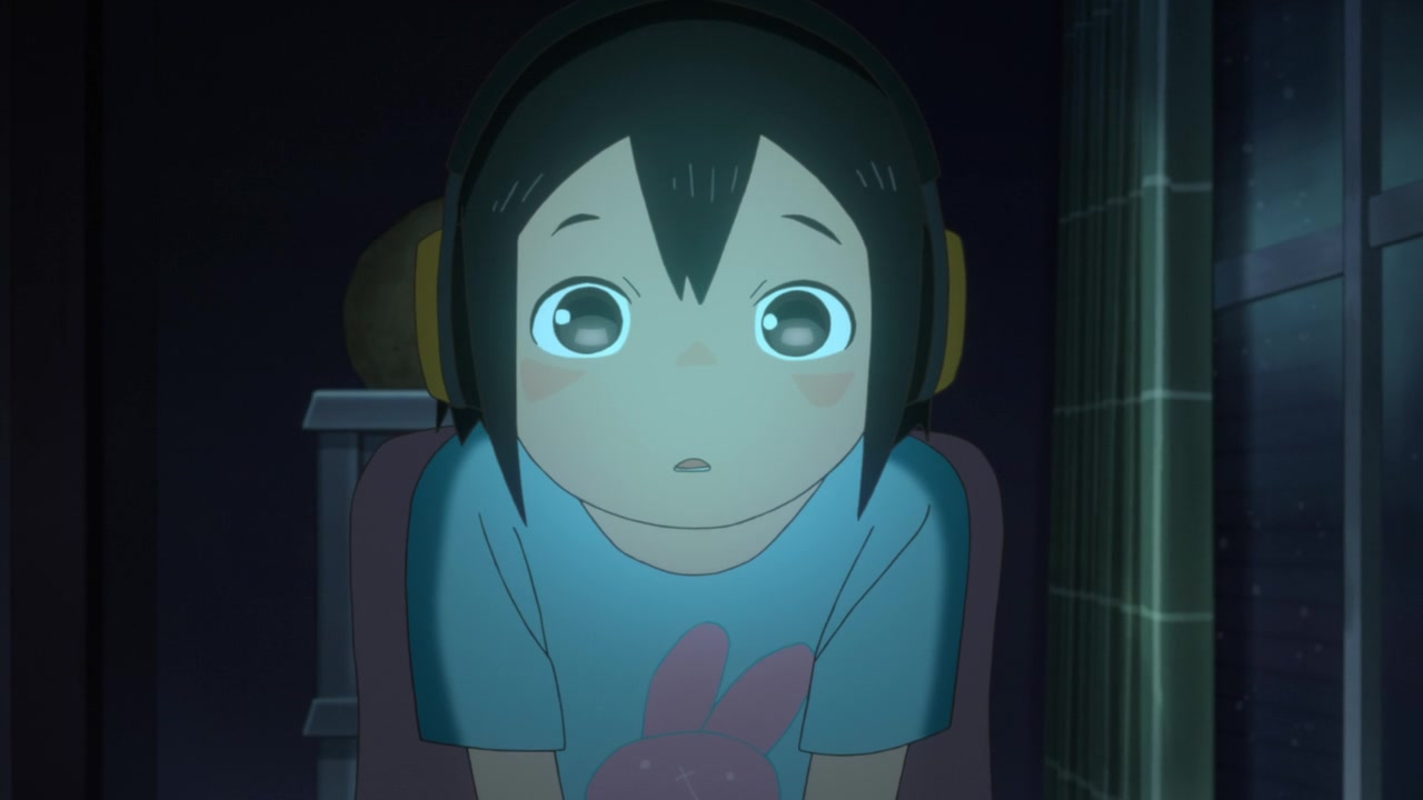 A short-haired anime girl staring at a bright computer screen in amazement in Keep Your Eizouken! A short-haired anime girl staring at a bright computer screen in amazement in Keep Your Eizouken!