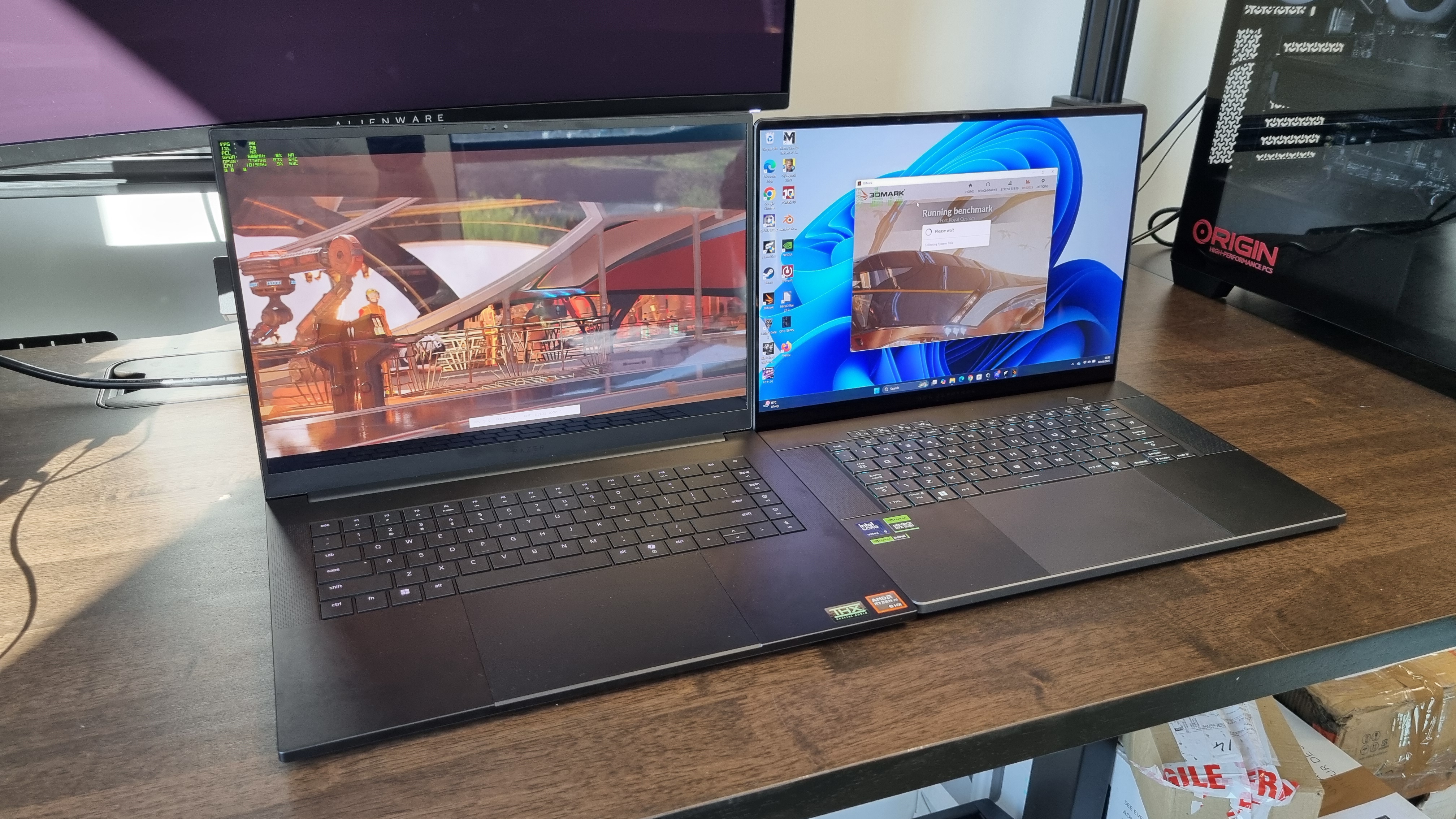 The Razer Blade 16 and the Asus ROG Zephyrus G16, side by side for a comparison