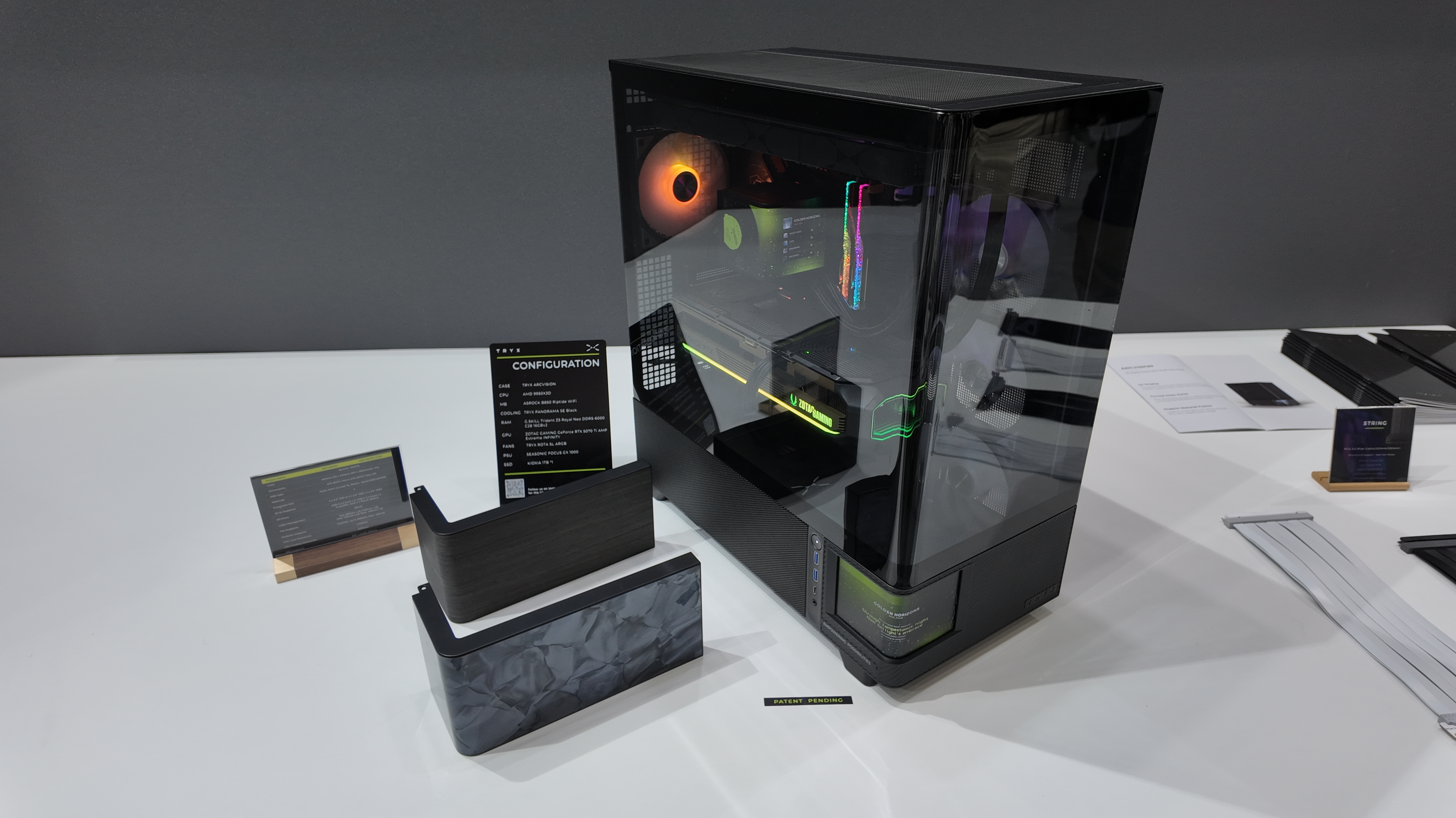 Tryx's Computex 2025 booth, showcasing various new PC cases and coolers.