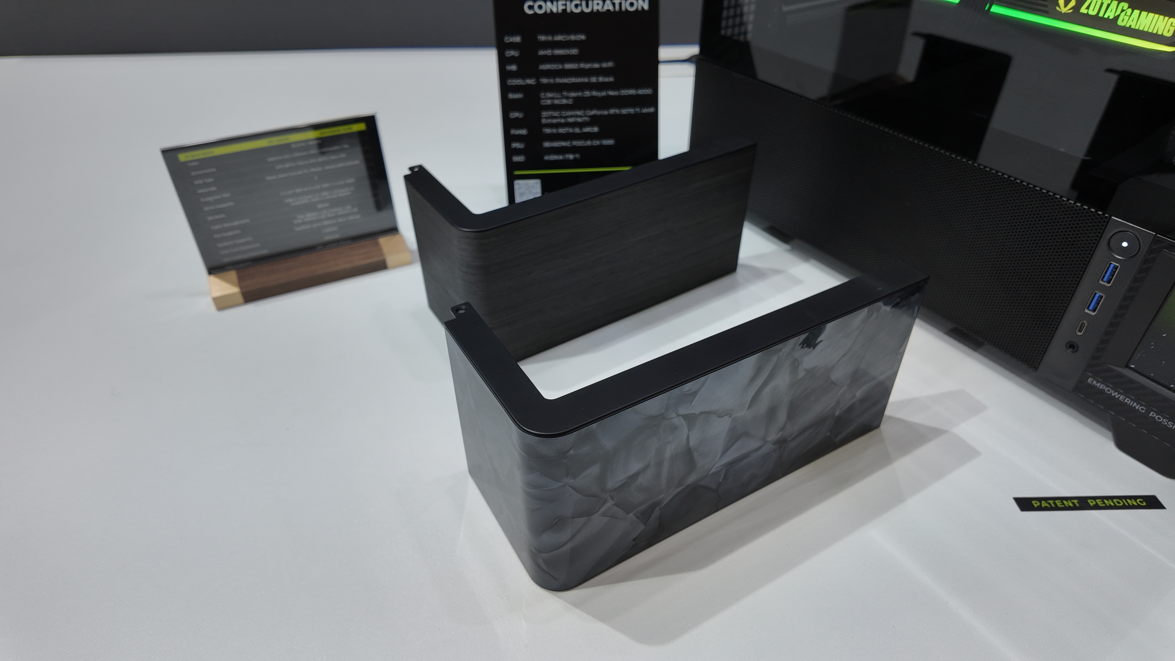 Tryx's Computex 2025 booth, showcasing various new PC cases and coolers.