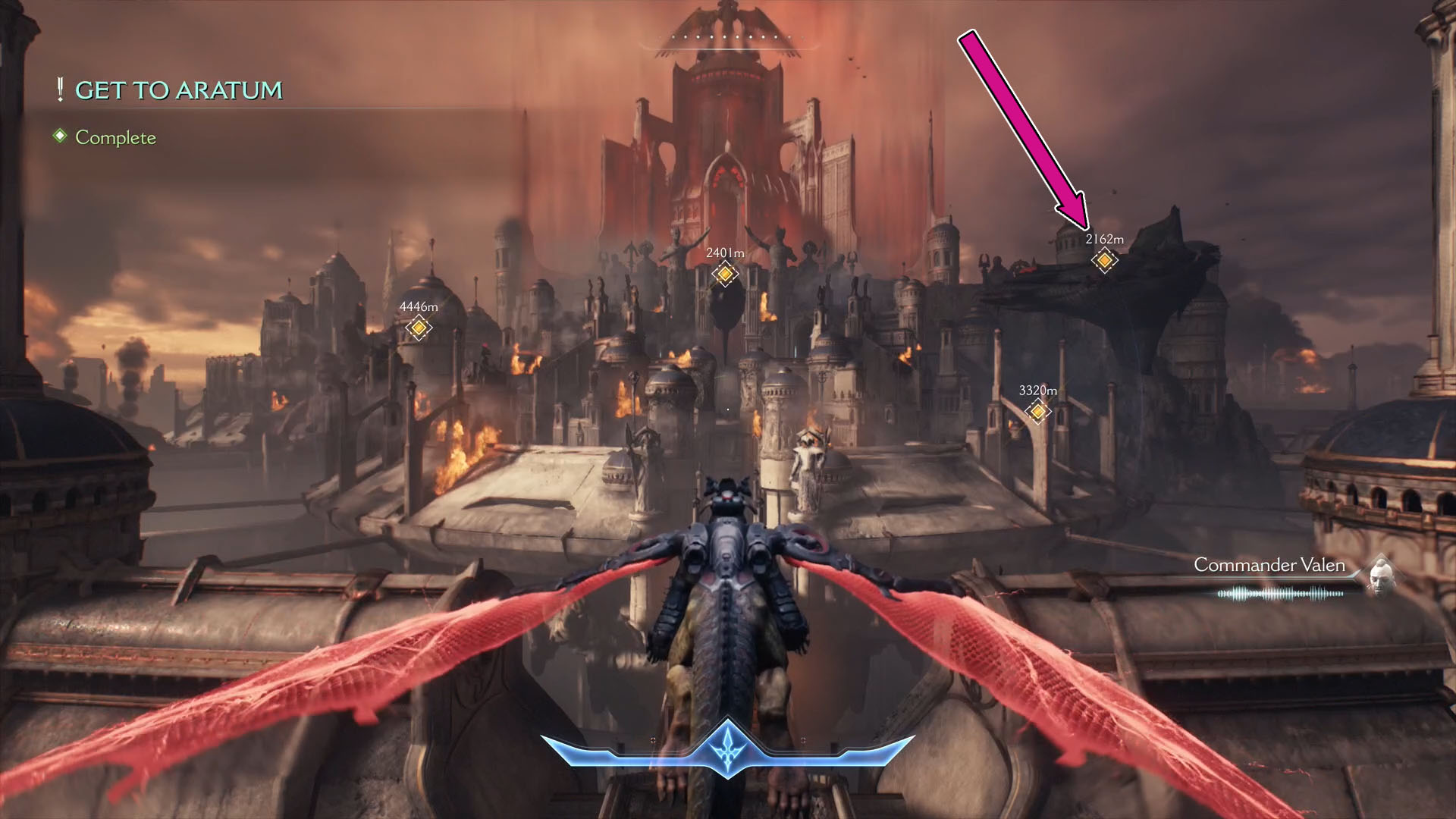 A Doom: Dark Ages screenshot showing the character flying on their cyberdragon and a pink arrow on the right side of the image poiting to a specific ship. A Doom: Dark Ages screenshot showing the character flying on their cyberdragon and a pink arrow on the right side of the image poiting to a specific ship.