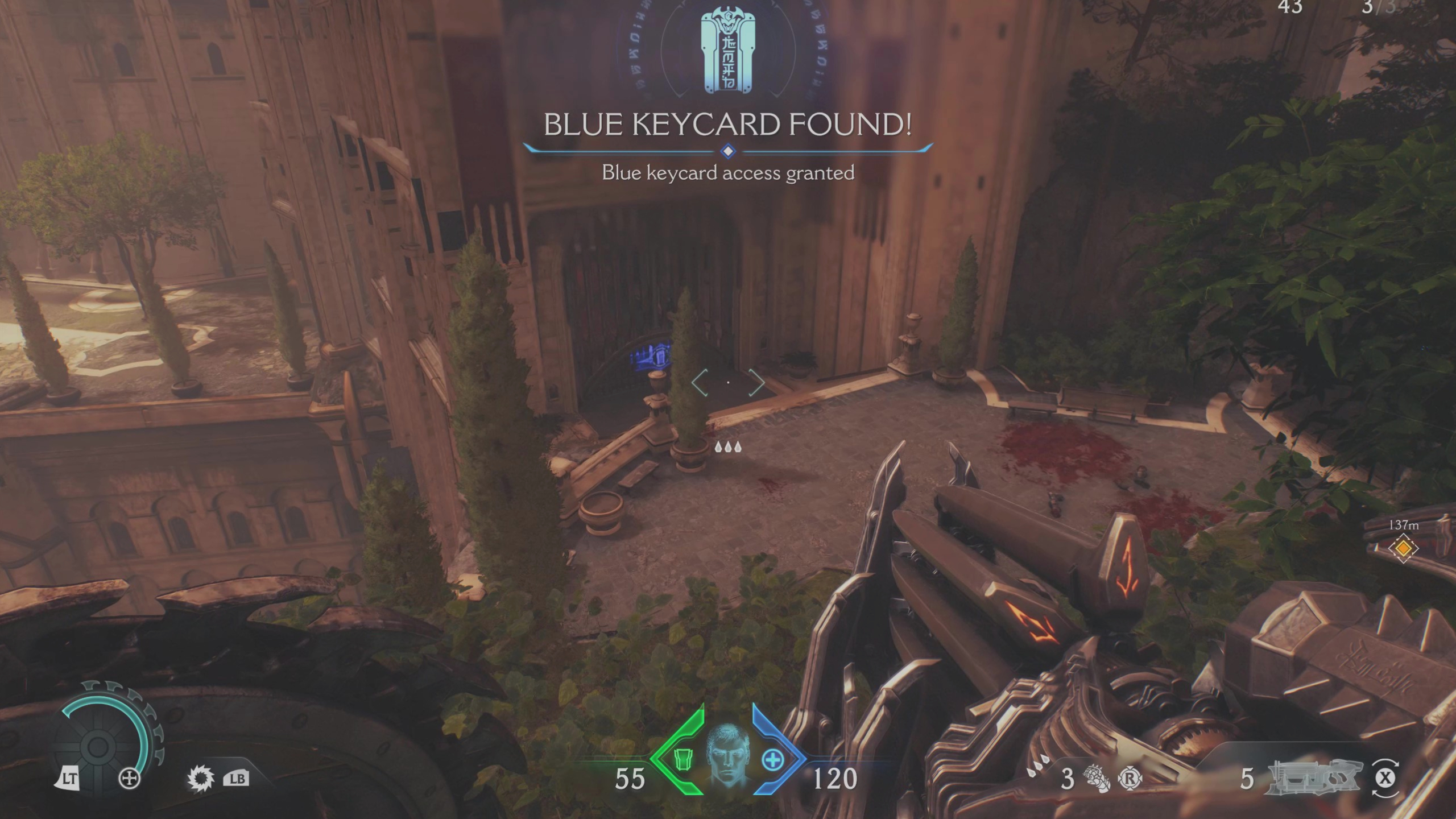 Doom: The Dark Ages Holy City of Aratum secrets - A gate requiring a blue keycard in a plaza below.