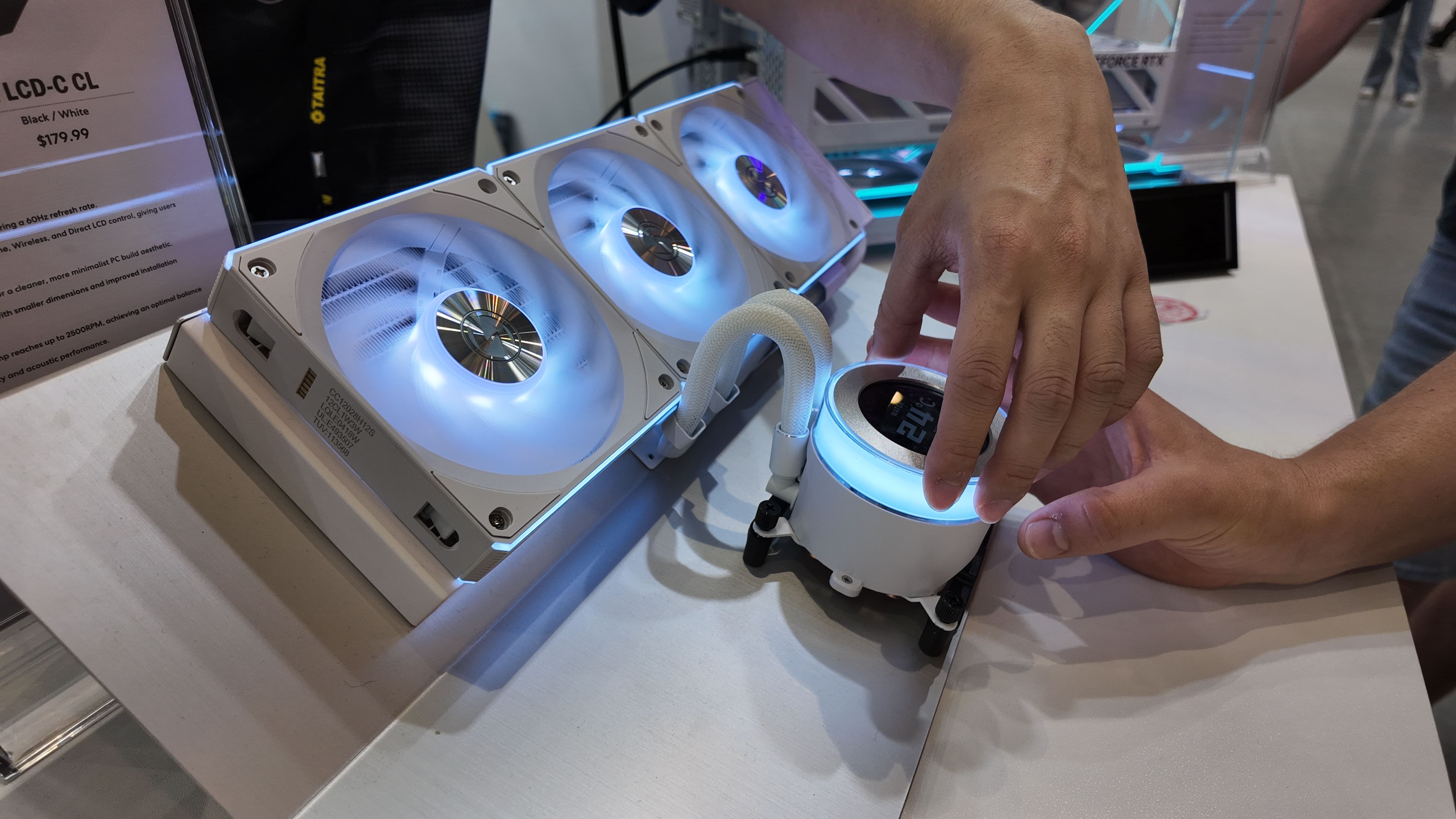A photo of a Lian Li Hydroshift LCD-C LC AIO liquid CPU cooler, as displayed at Computex 2025