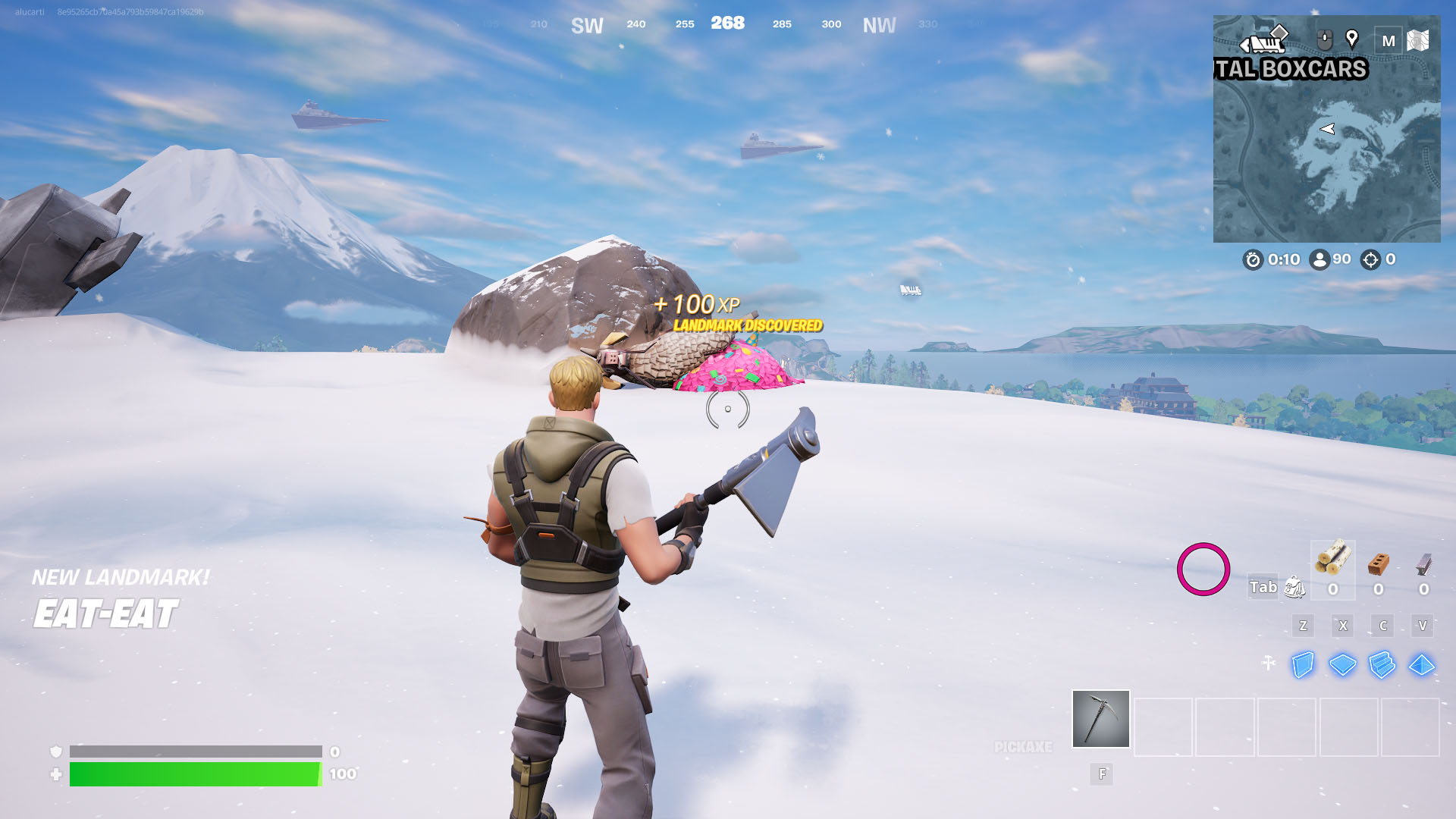 A Fortnite screenshow showing a hiding spot in the form of a pink piñata on a mountain. A Fortnite screenshow showing a hiding spot in the form of a pink piñata on a mountain.