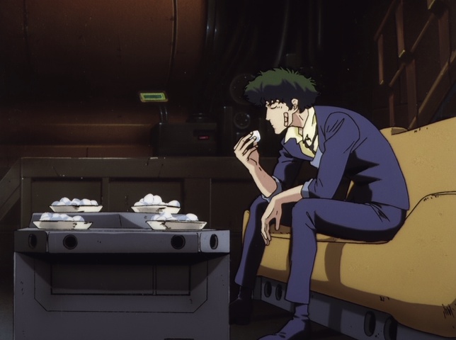 Spike, slumped alone over a table, eating food in Cowboy Bebop Spike, slumped alone over a table, eating food in Cowboy Bebop