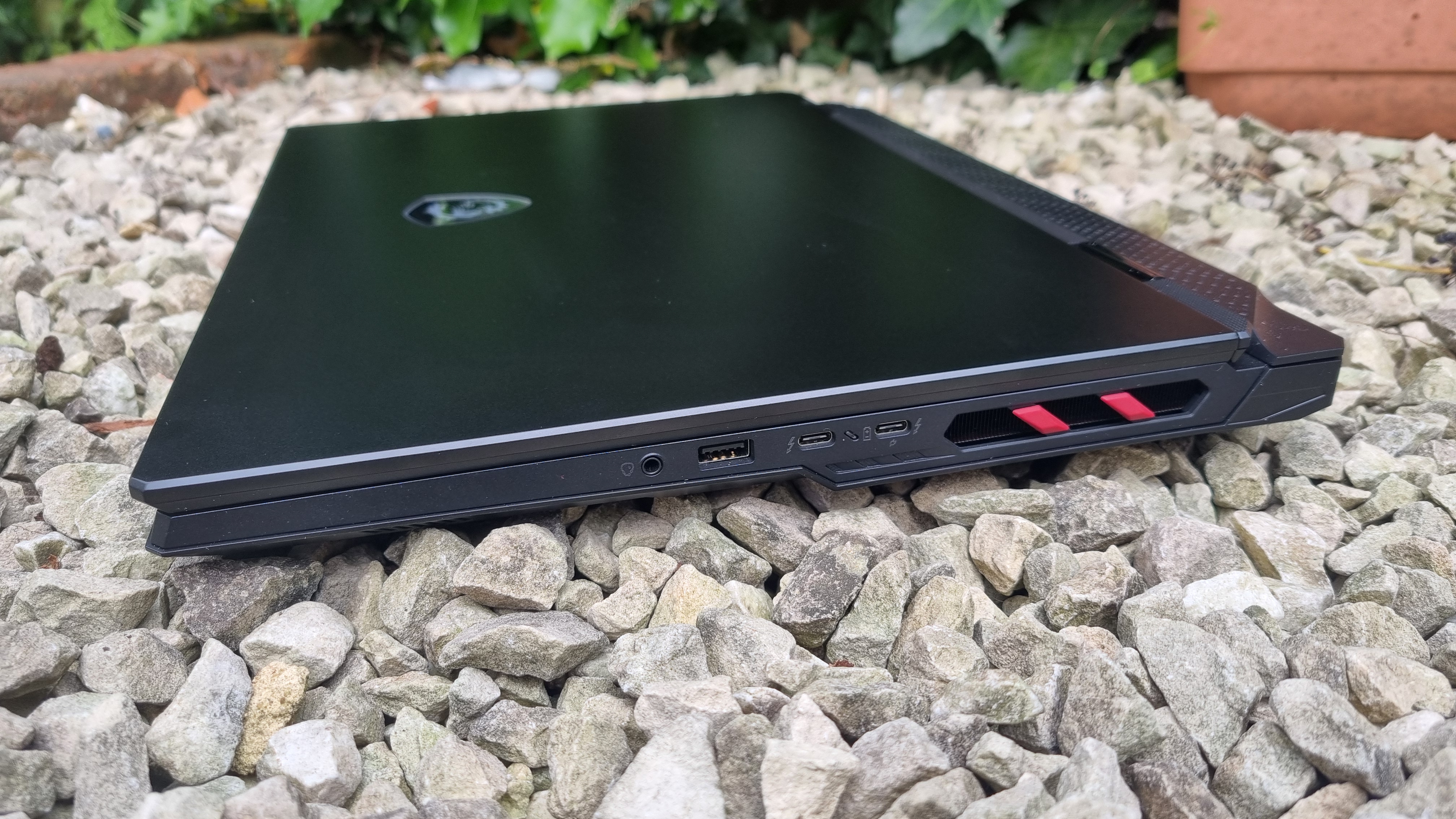 The right-side vents of the MSI Raider 18 HX AI A2XW, showing the thickness of the laptop overall and various ports