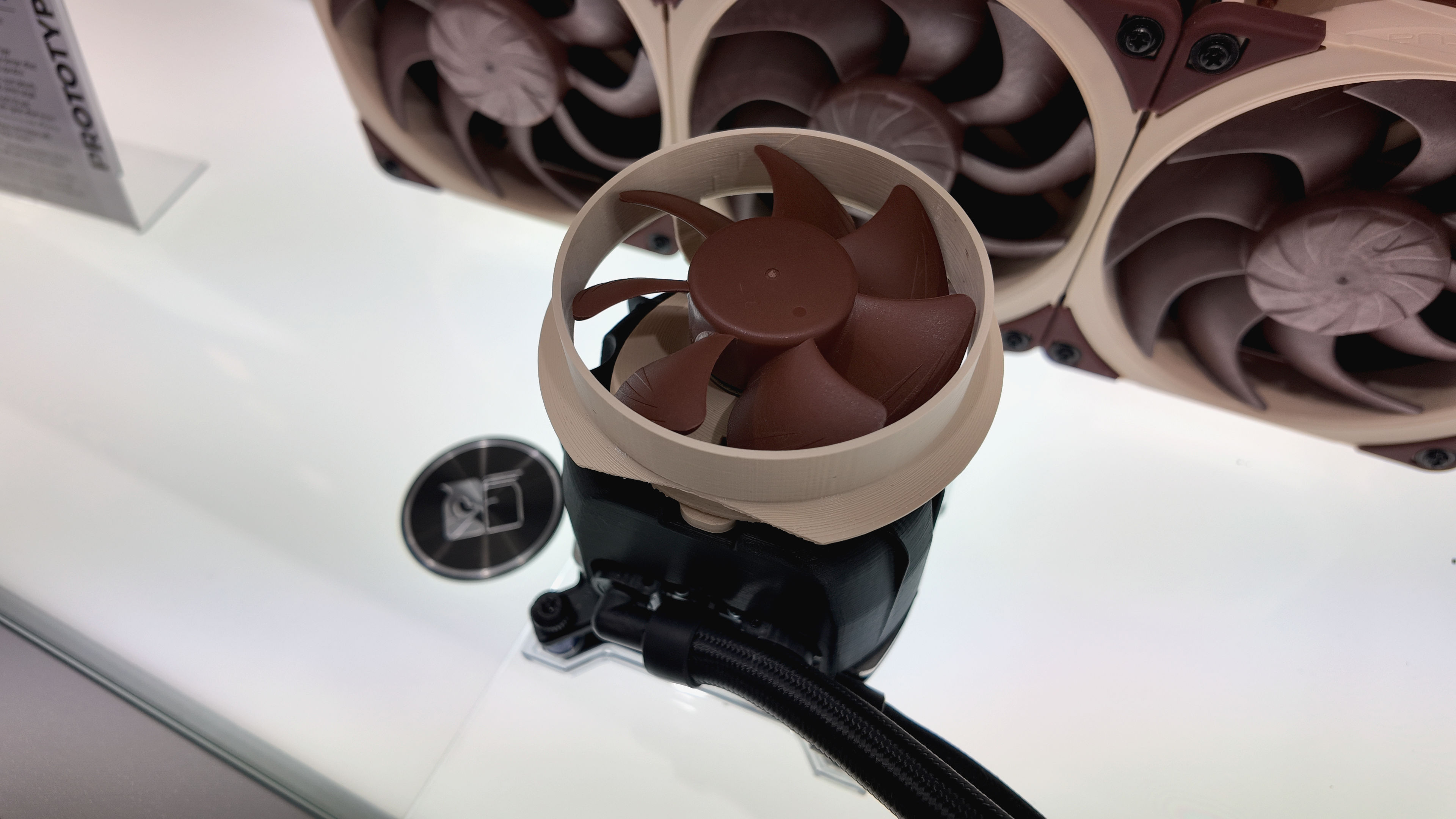 A photo of Noctua's collaboration with Asetek, an AIO liquid cooler, as displayed at Computex 2025