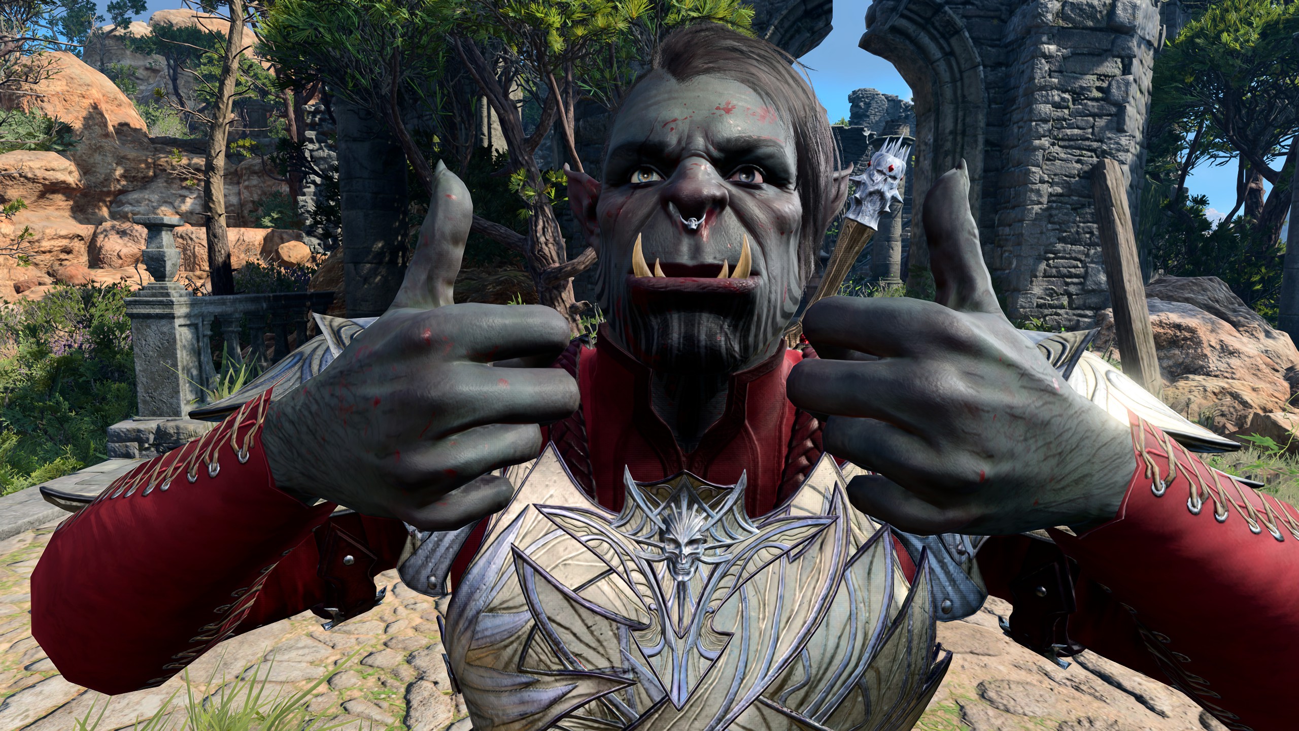 Half Orc smiling at camera giving two thumbs up in Baldur's Gate 3