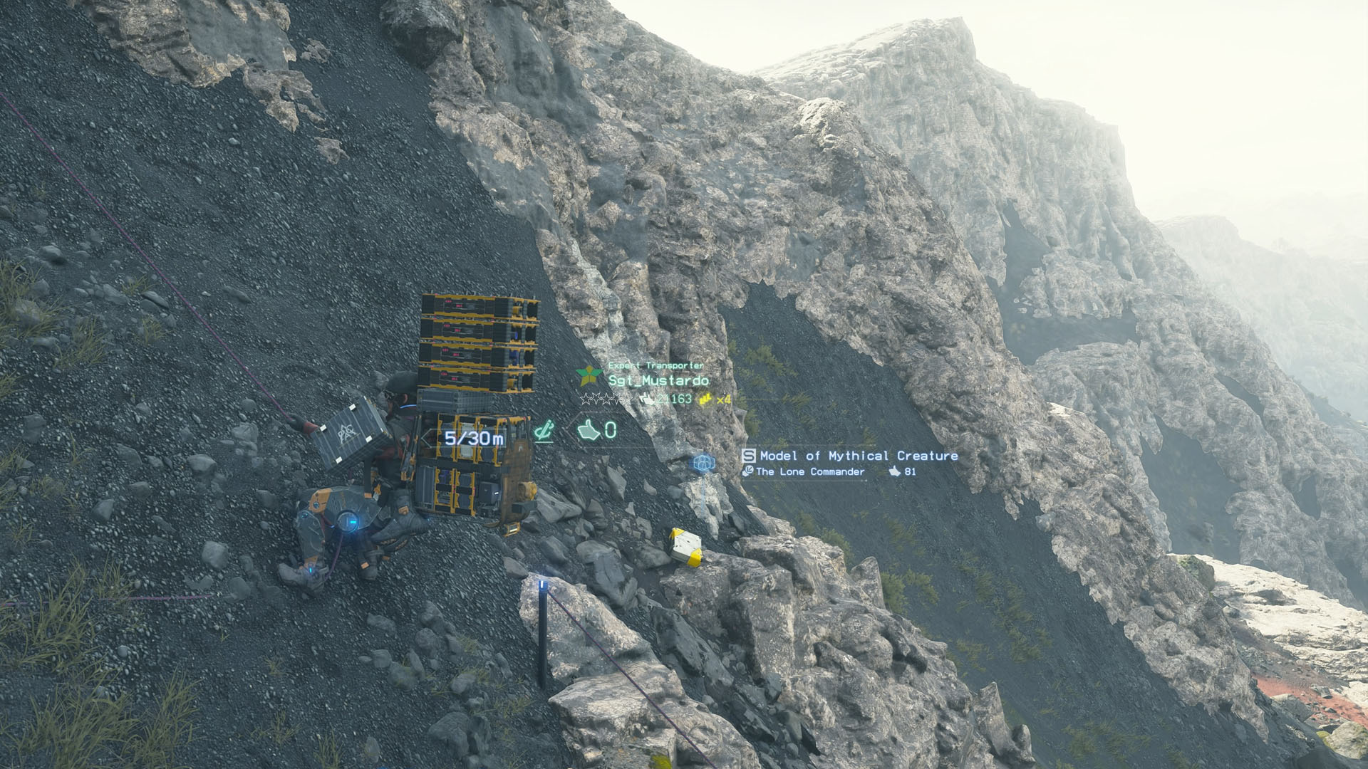 A Death Stranding 2 screenshot using a climb anchor on a cliff to descend. A Death Stranding 2 screenshot using a climb anchor on a cliff to descend.