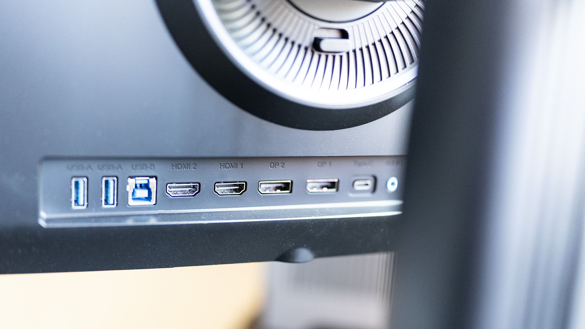 An Acer Predator X32X gaming monitor set up on a desk.