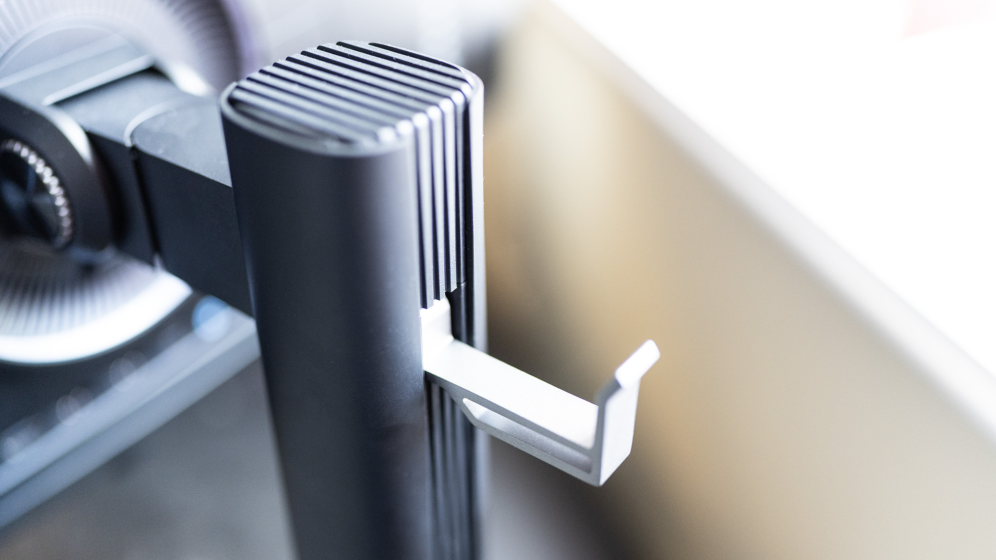 An Acer Predator X32X gaming monitor set up on a desk.