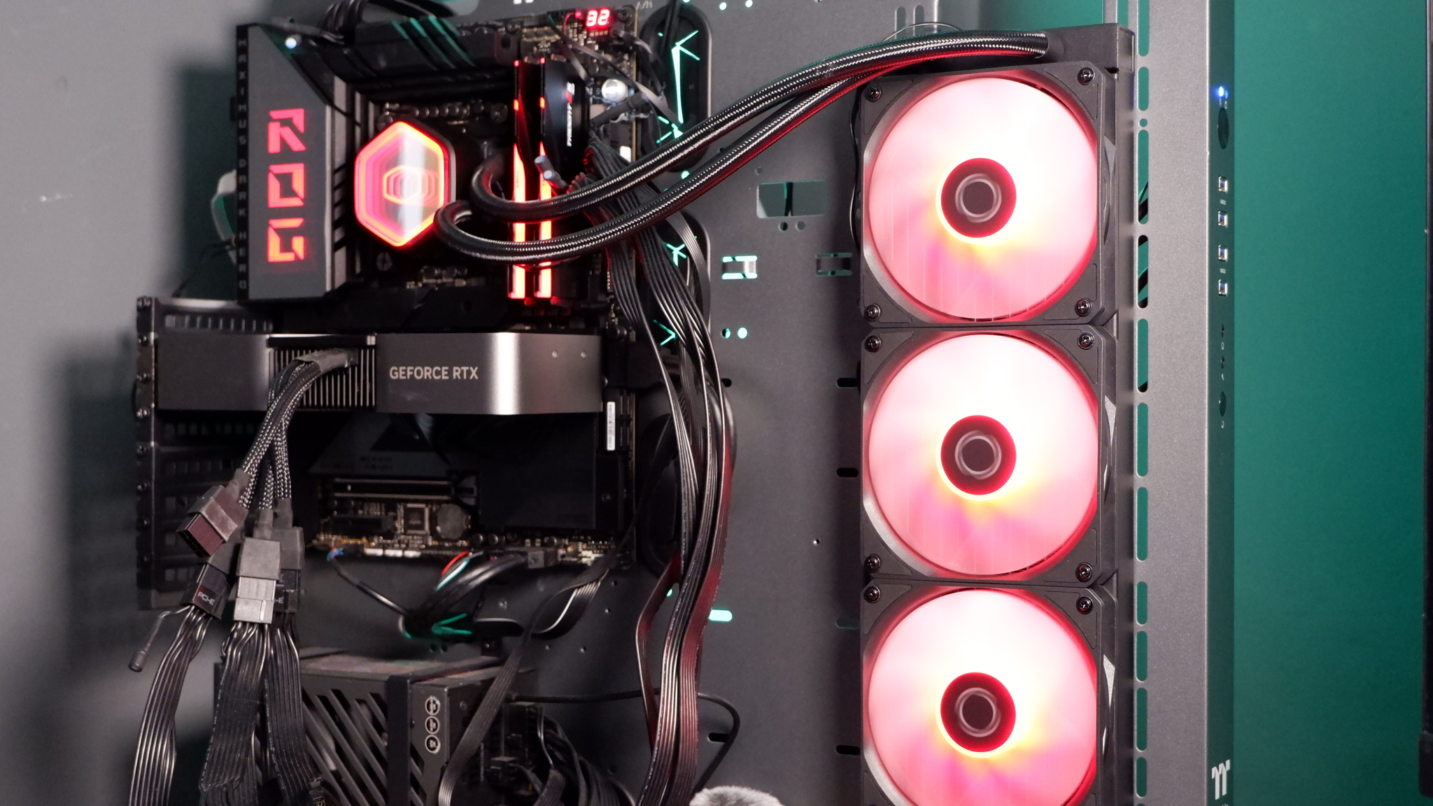A Cooler Master MasterLiquid 360 Core II liquid cooler set-up on a test bench.