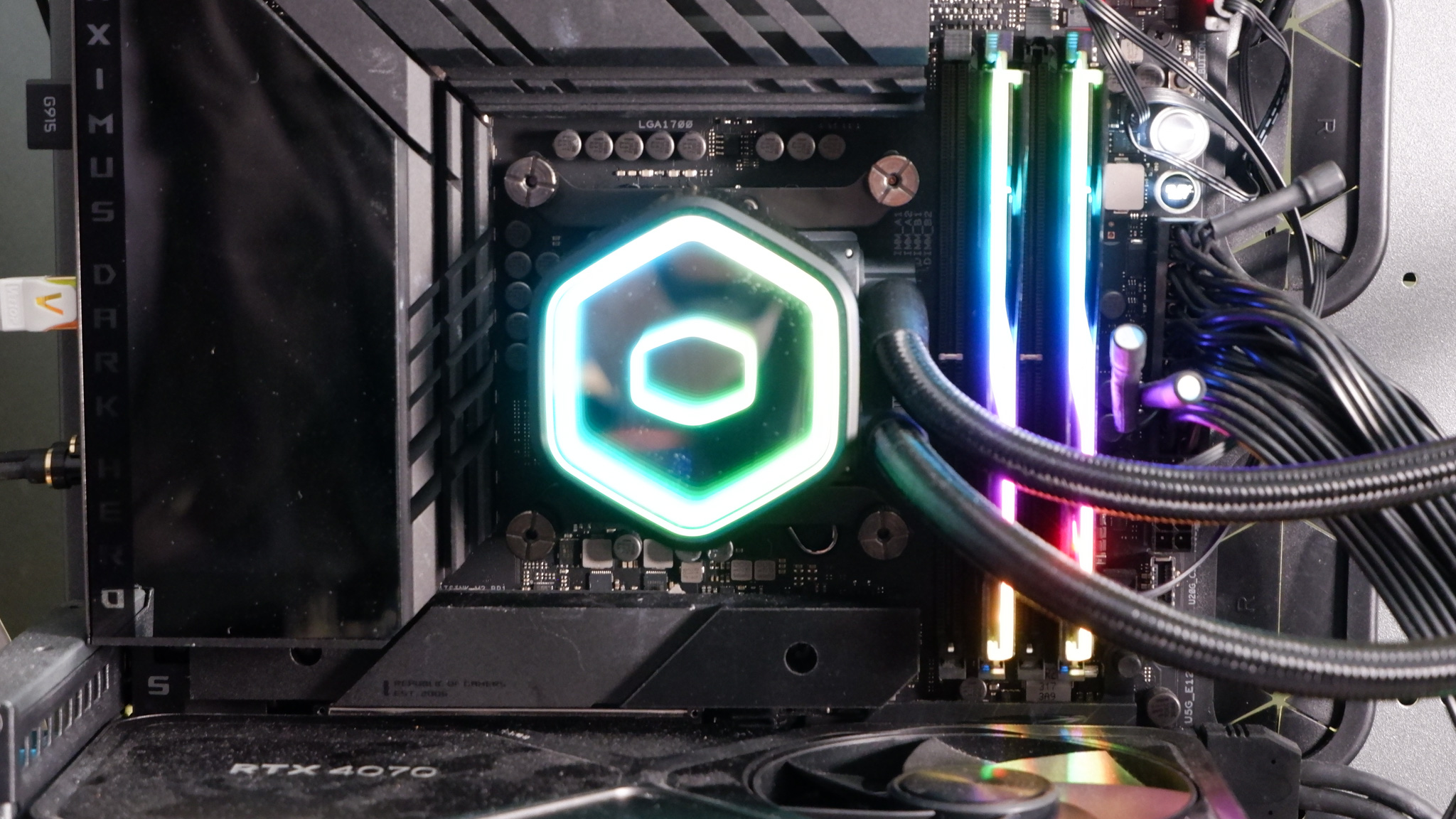 A Cooler Master MasterLiquid 360 Core II liquid cooler set-up on a test bench.