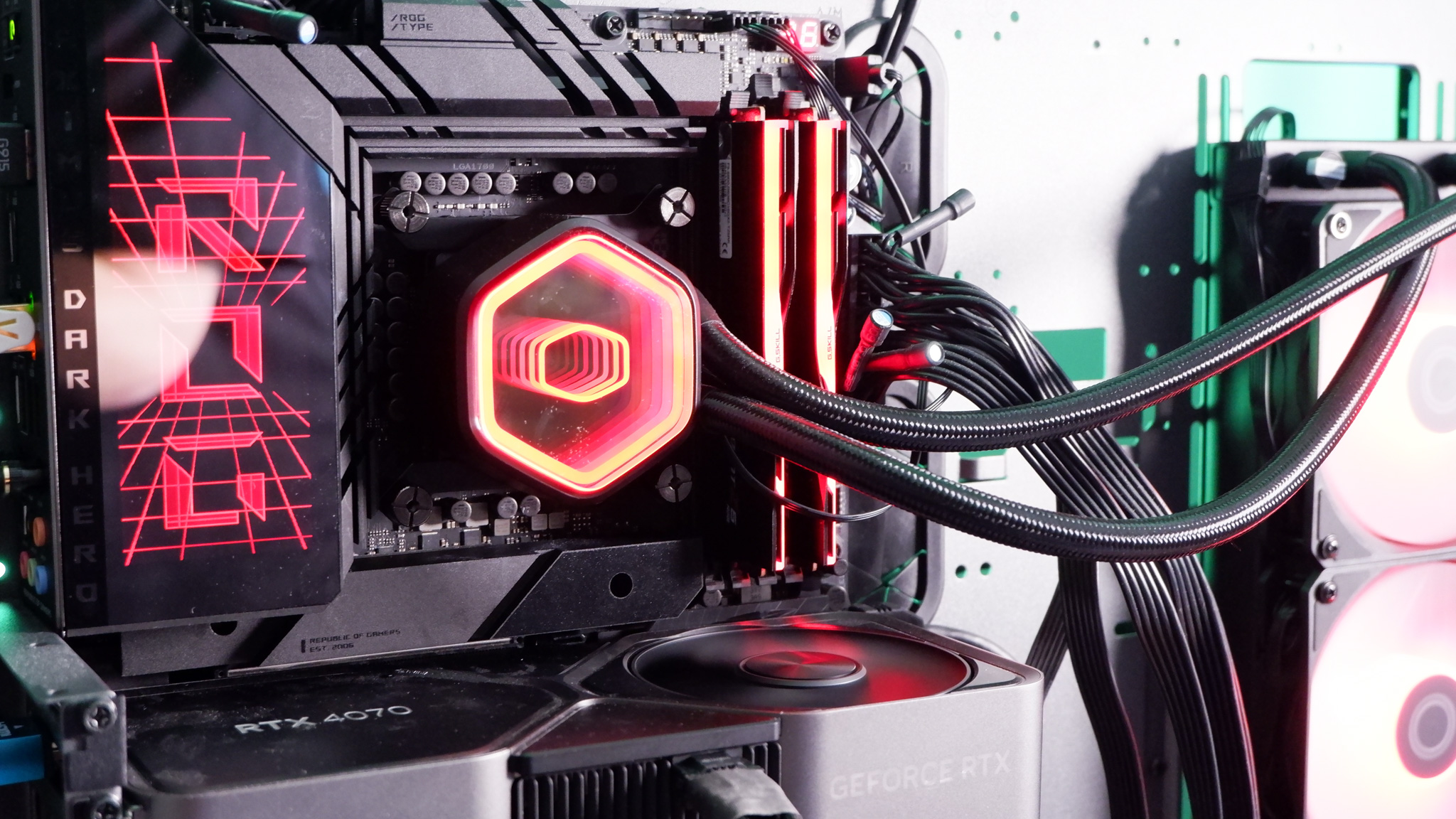 A Cooler Master MasterLiquid 360 Core II liquid cooler set-up on a test bench.