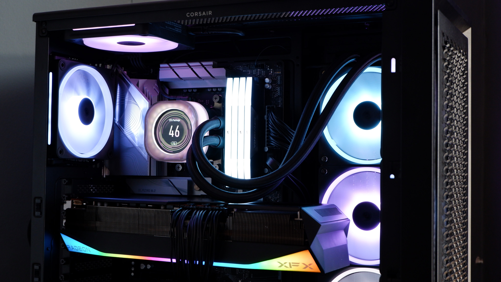 Corsair iCUE Link Titan 360 RX LCD liquid cooler set up on a test bench.