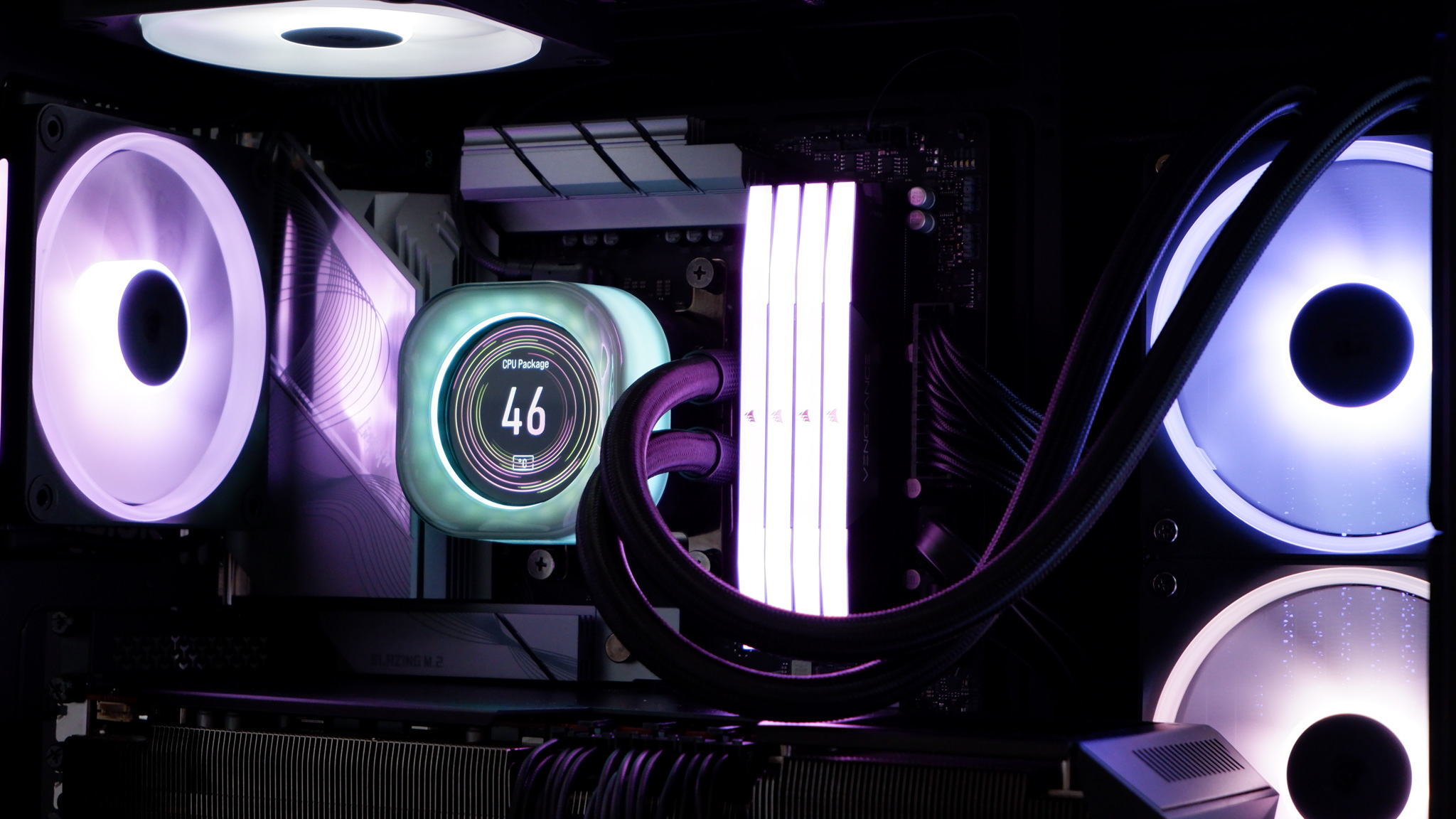 Corsair iCUE Link Titan 360 RX LCD liquid cooler set up on a test bench.