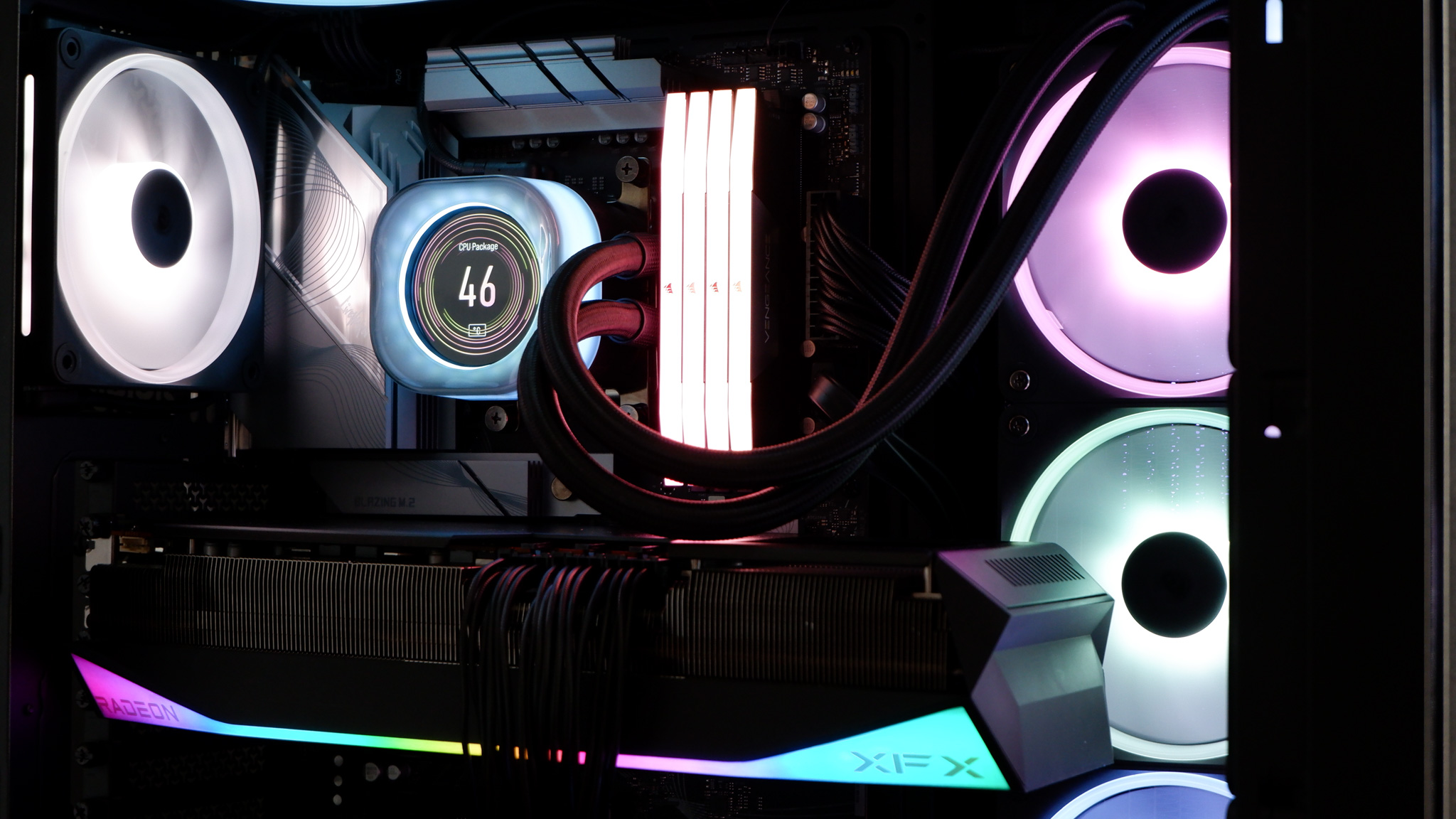 Corsair iCUE Link Titan 360 RX LCD liquid cooler set up on a test bench.