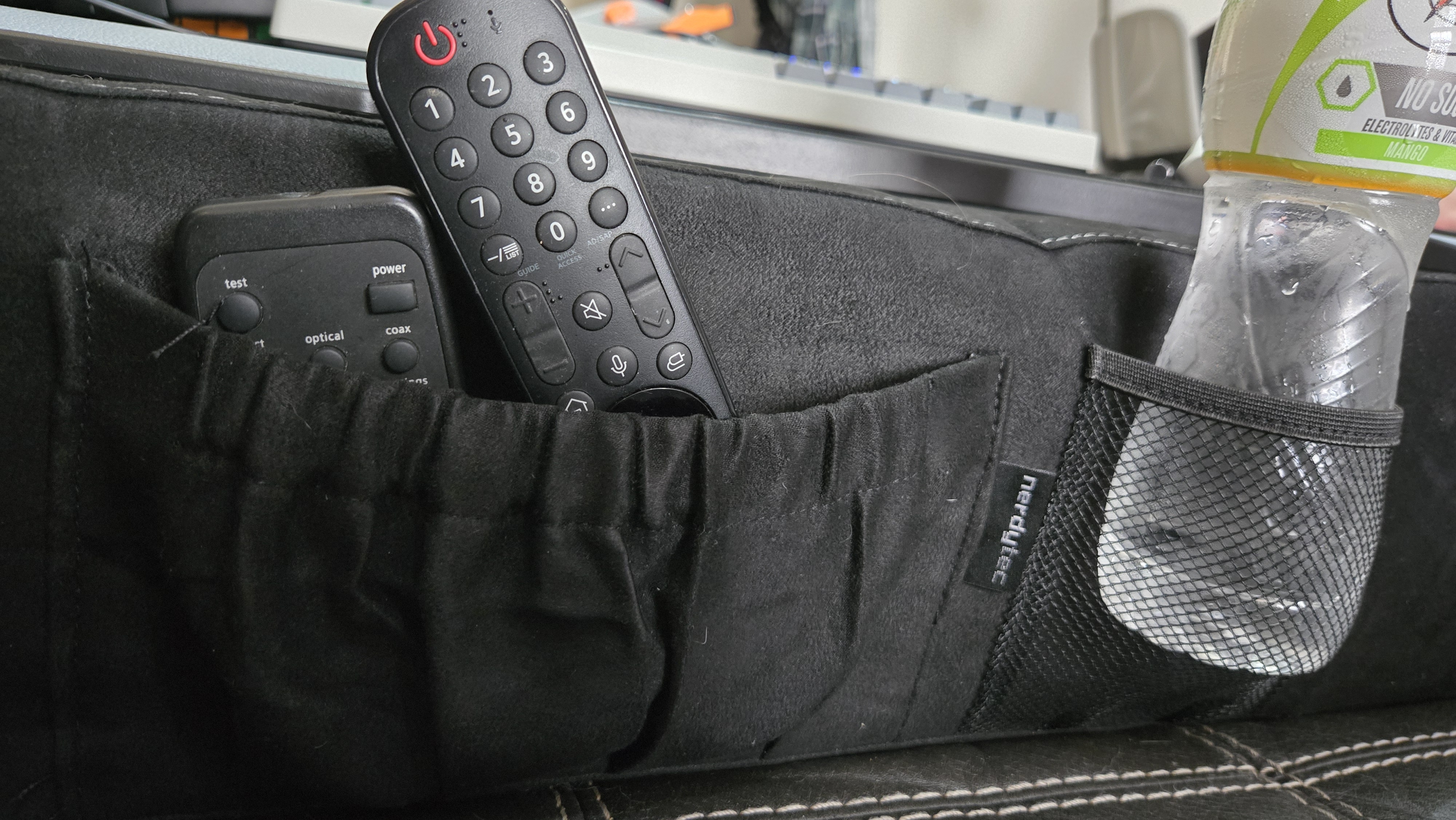 Couchmaster Cycon3 set-up on a sofa with a keyboard and mouse.