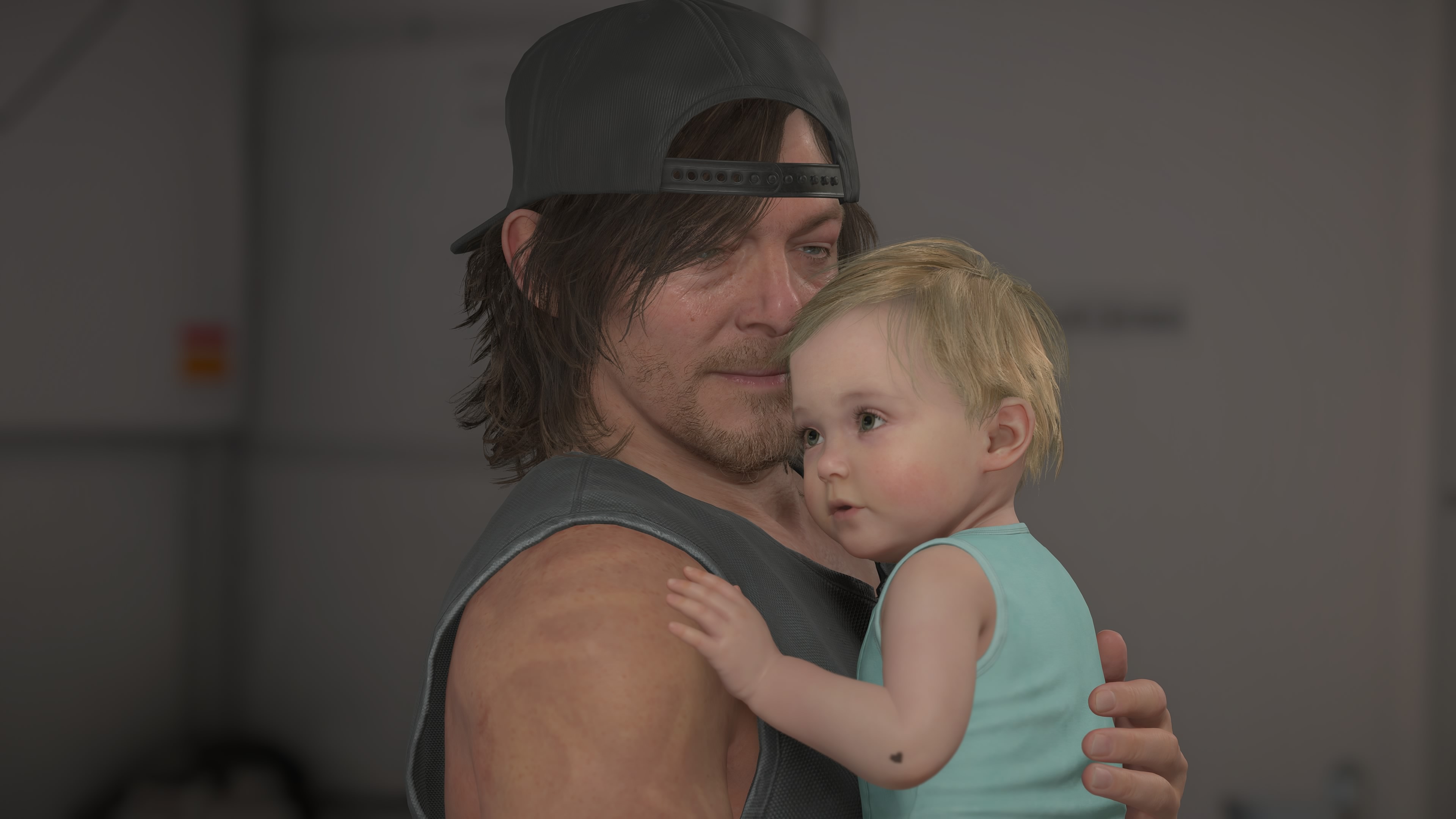 Death Stranding 2 birthday DOOMS: Sam looking at Lou as he holds her to his chest.