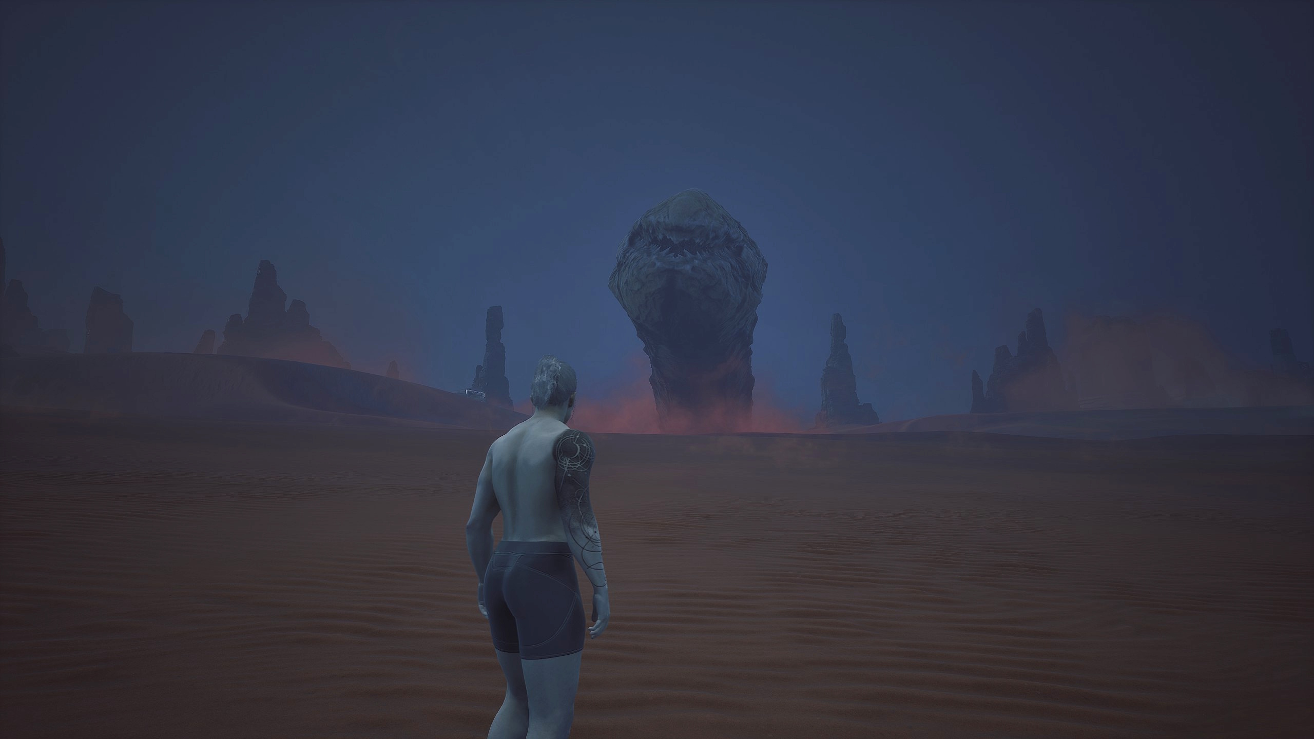 A sandworm staring down a character in Dune Awakening after failing to eat him