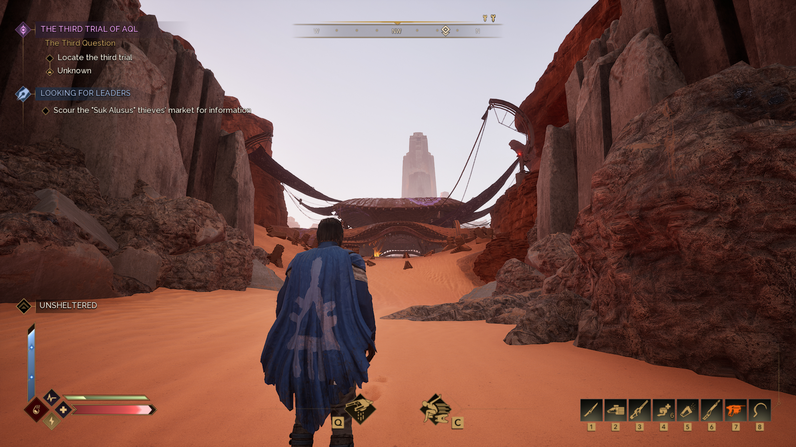 Dune: Awakening carbide scraps location - A player walking into an outpost up a short hill behind a broken wall.