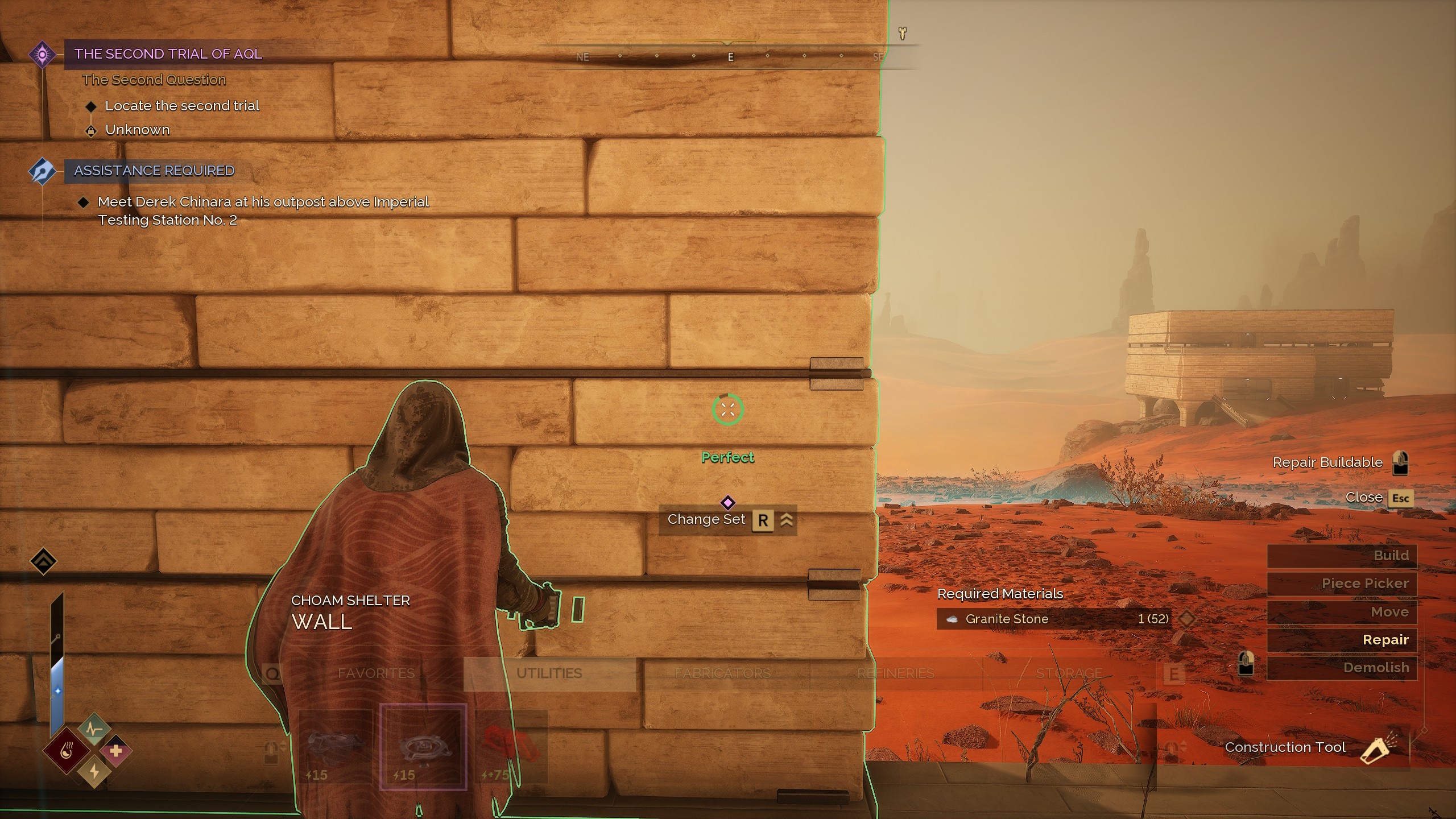 A Dune Awakening player pointing the construction tool’s repair function at a partially damaged wall.