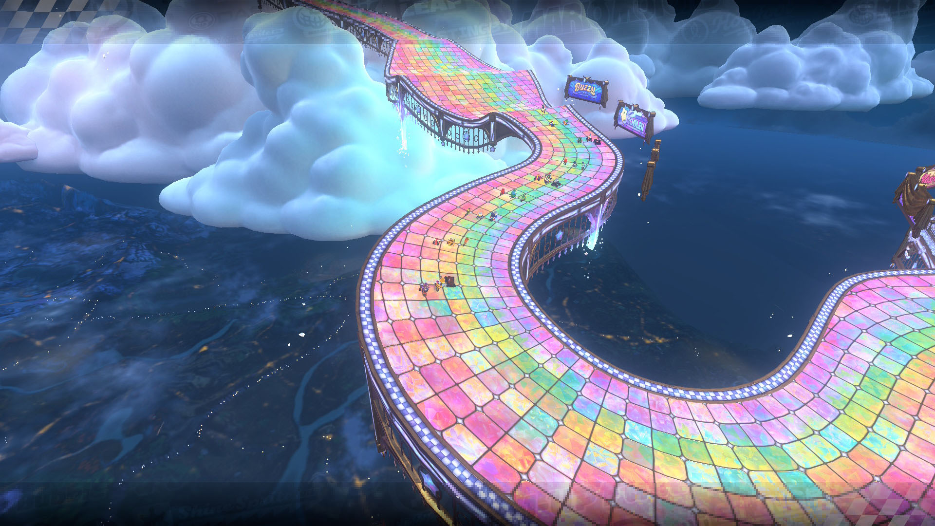 A Mario Kart World screenshot showing the Rainbow Road track from above. A Mario Kart World screenshot showing the Rainbow Road track from above.